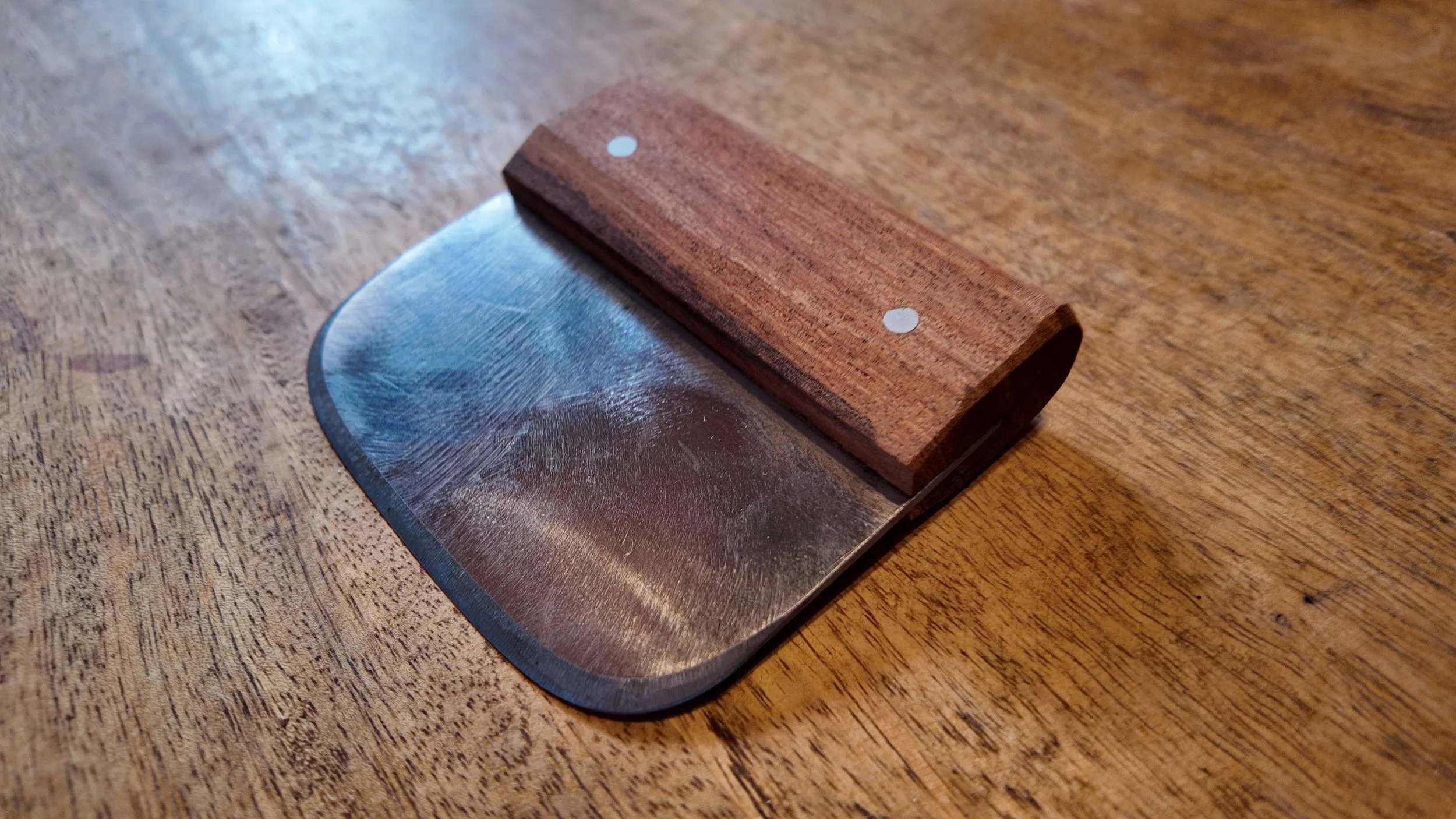 The Slicker blunt tool for softening tanned hides and finishing leather top view.JPG sideview.JPG