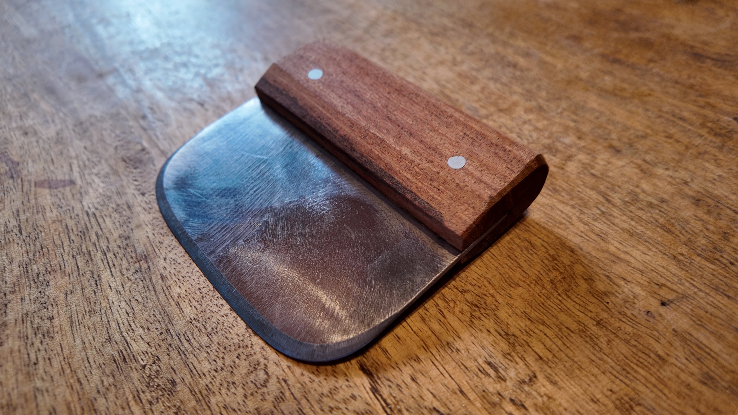 The Slicker blunt tool for softening tanned hides and finishing leather top view.JPG sideview.JPG
