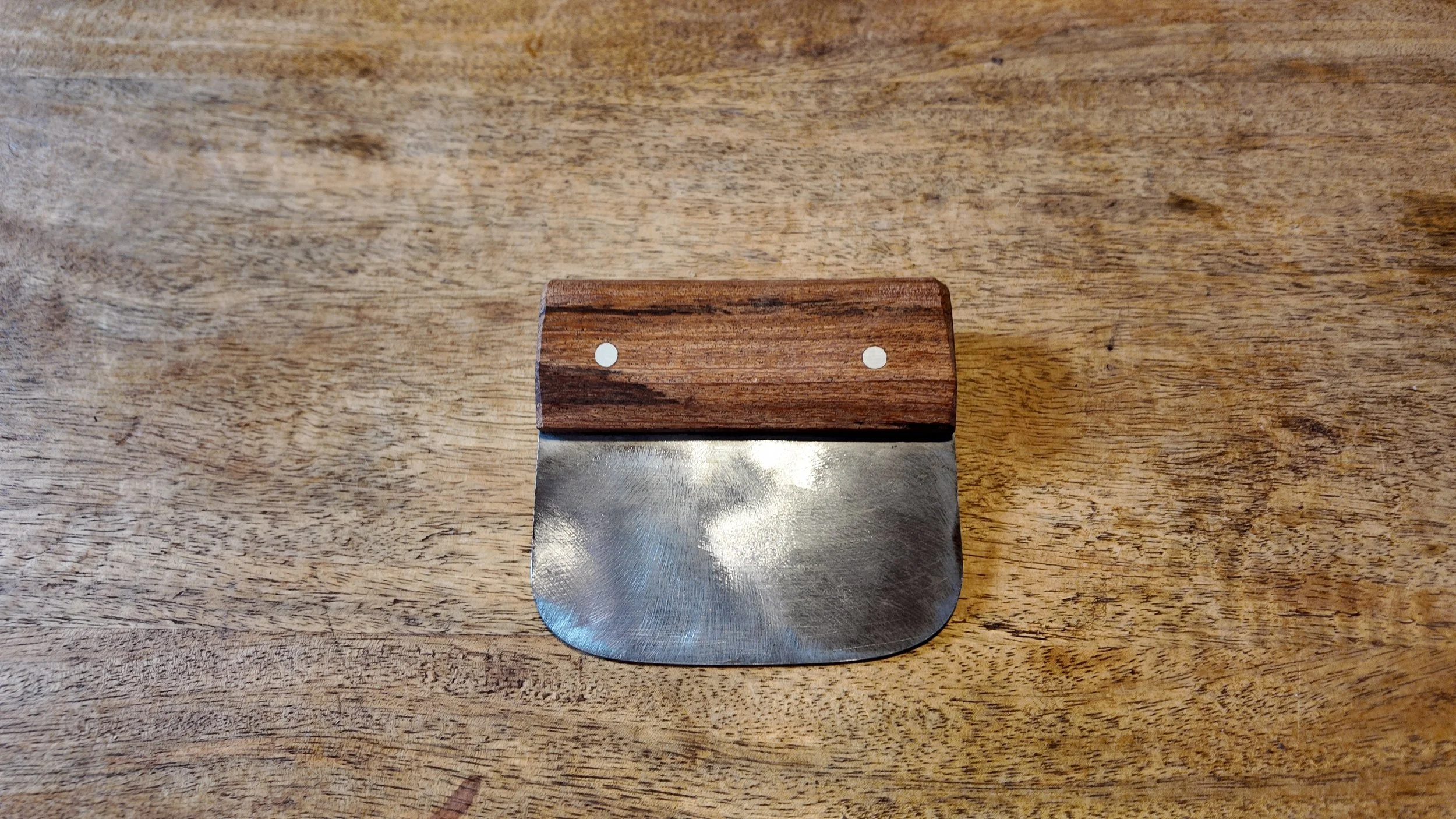 The Slicker - blunt tool for softening tanned hides and finishing barktan leathers