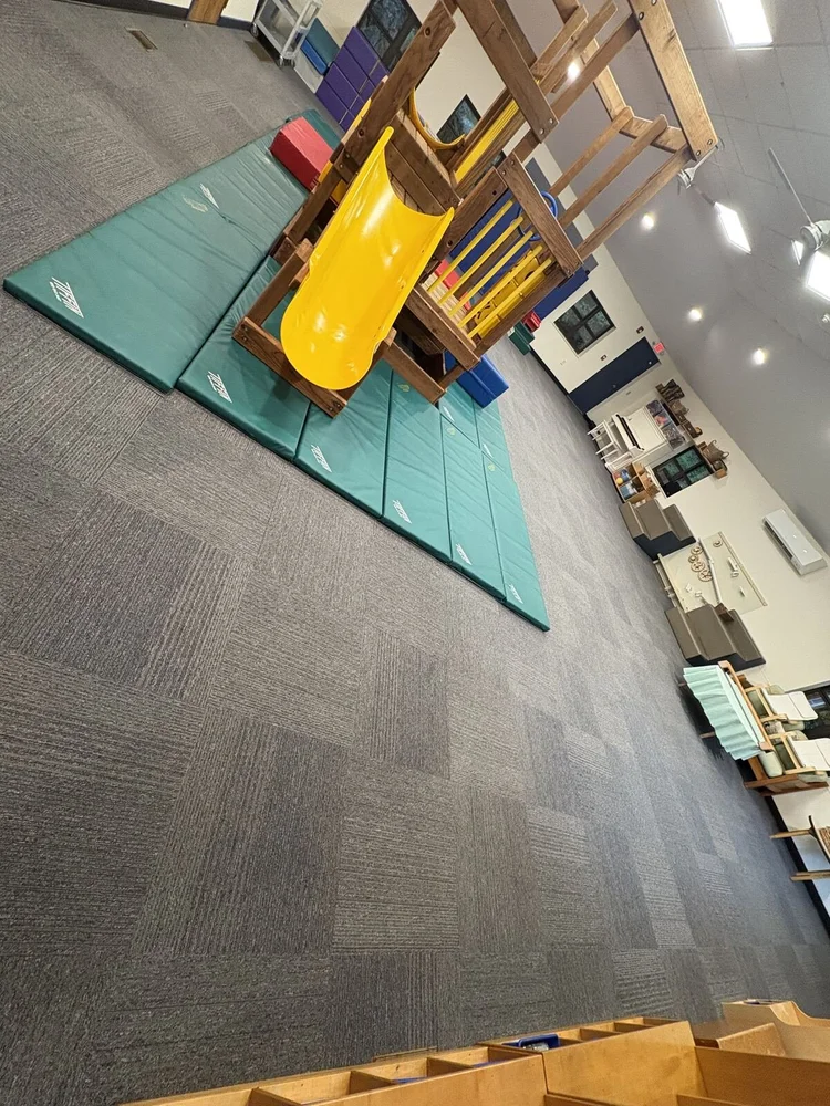Commercial carpet tile cleaned in a children's play area