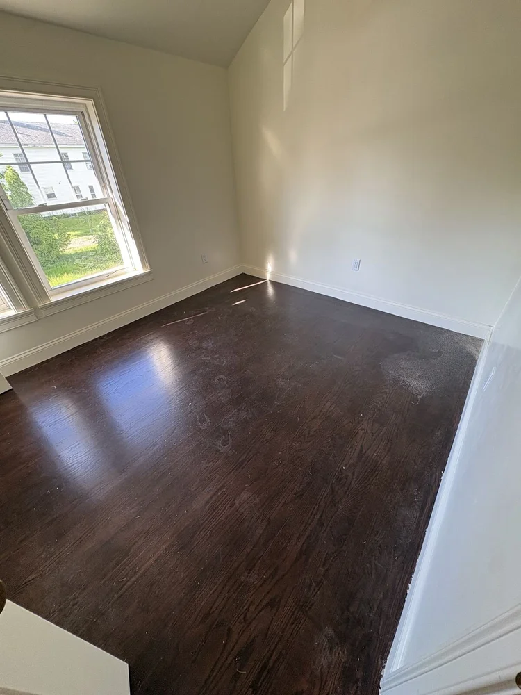 Clean, shining hardwood floor after post-construction cleaning on the North Shore