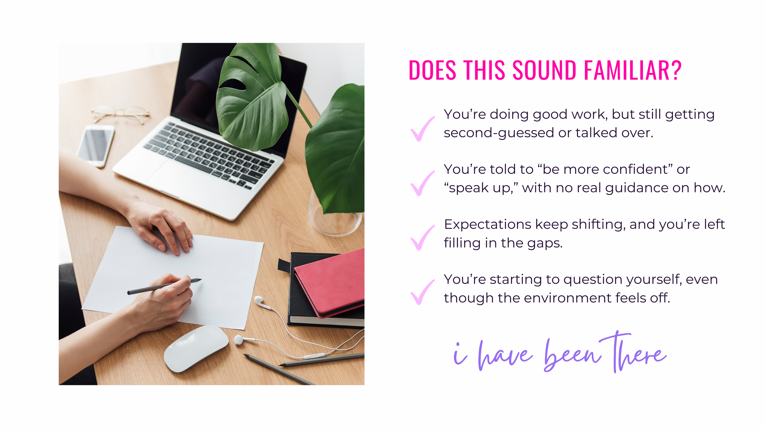 A workspace with an open laptop, a smartphone, a plant, a pair of glasses, a pink notebook, and a white mouse on a wooden desk. A person's hand is writing on a piece of paper with a black pen.