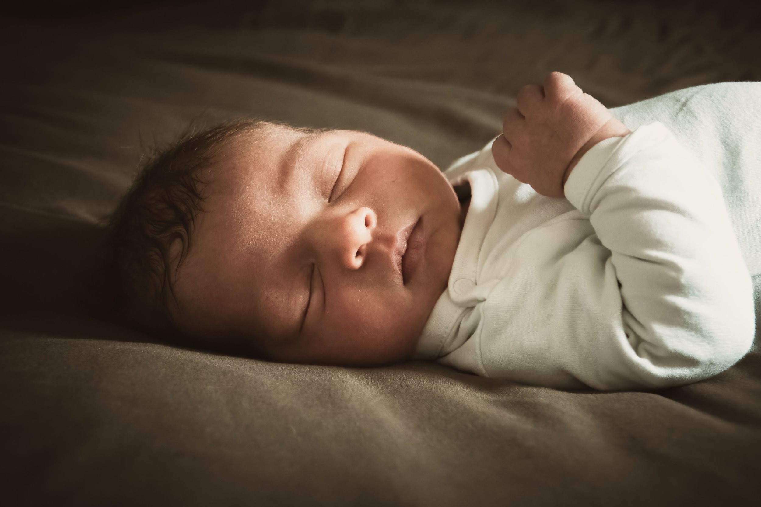 My Newborn Sleeps All Day and Is Awake All Night: What Can I Do?