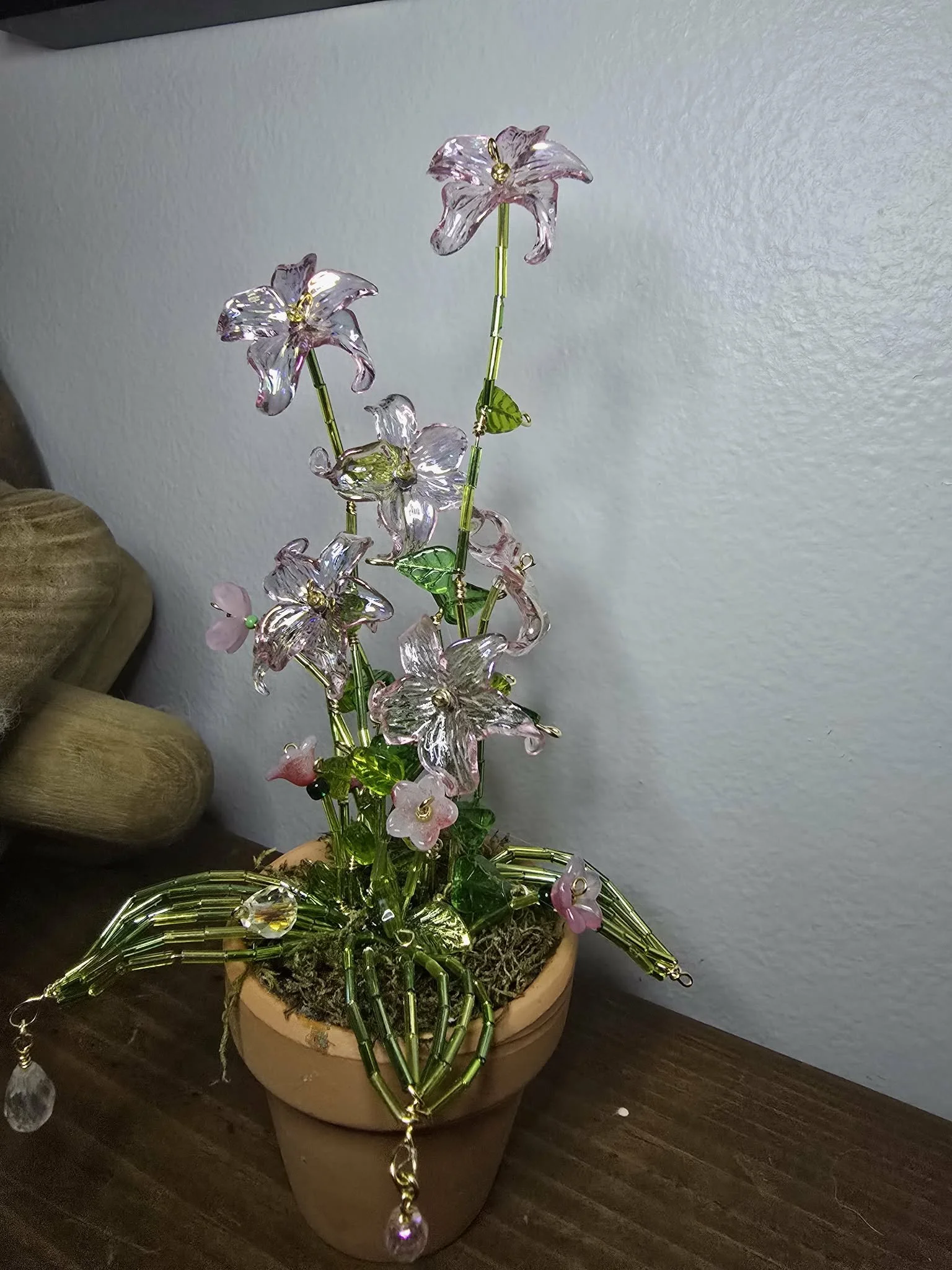 beaded pink flower in terracotta base