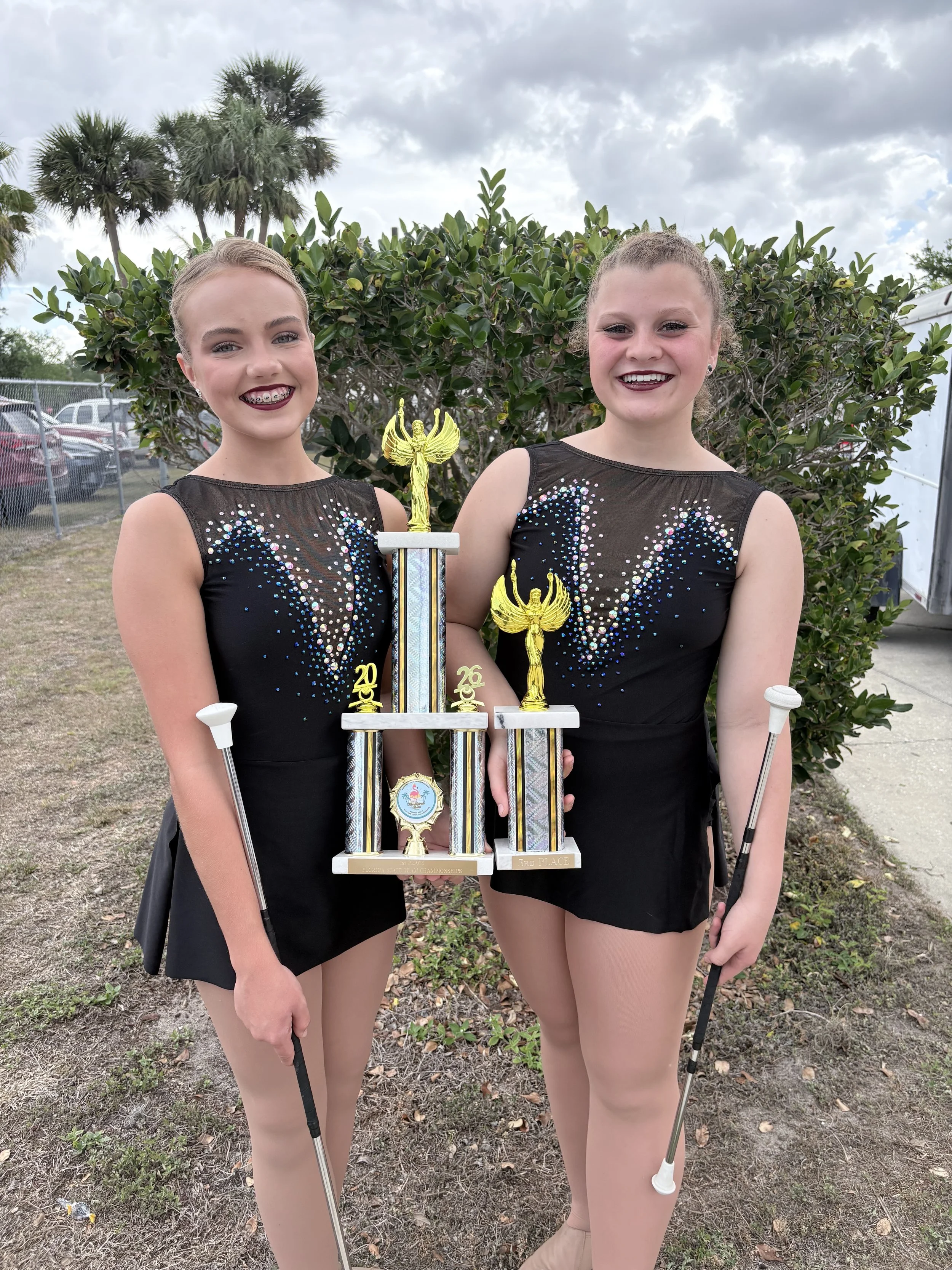 FLARE Baton Team Competitive Twirlers posing with their hard earned competition awards from the 2026 Miss Majorette of Florida Competition!