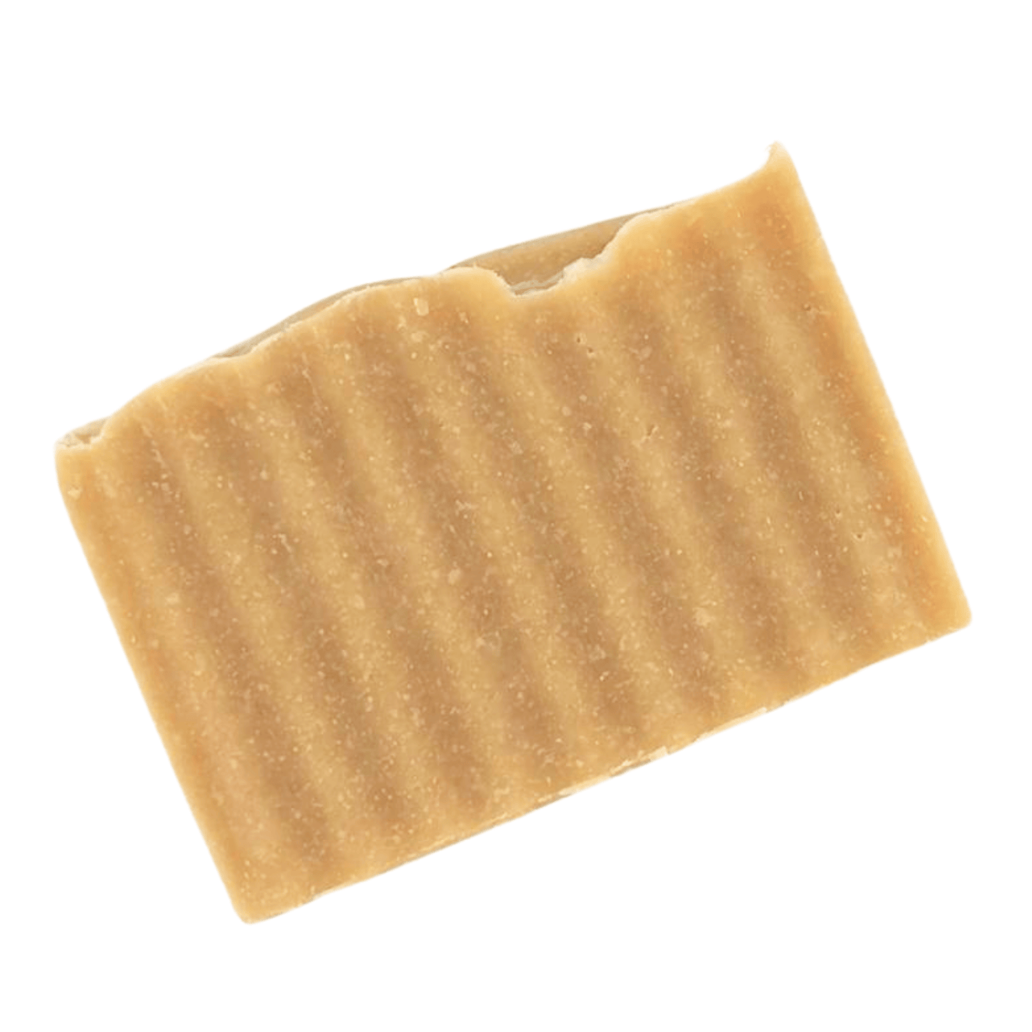 Angled view of Raw Honeycomb Nature's Polish exfoliating soap bar showing textured surface and honey colored finish.