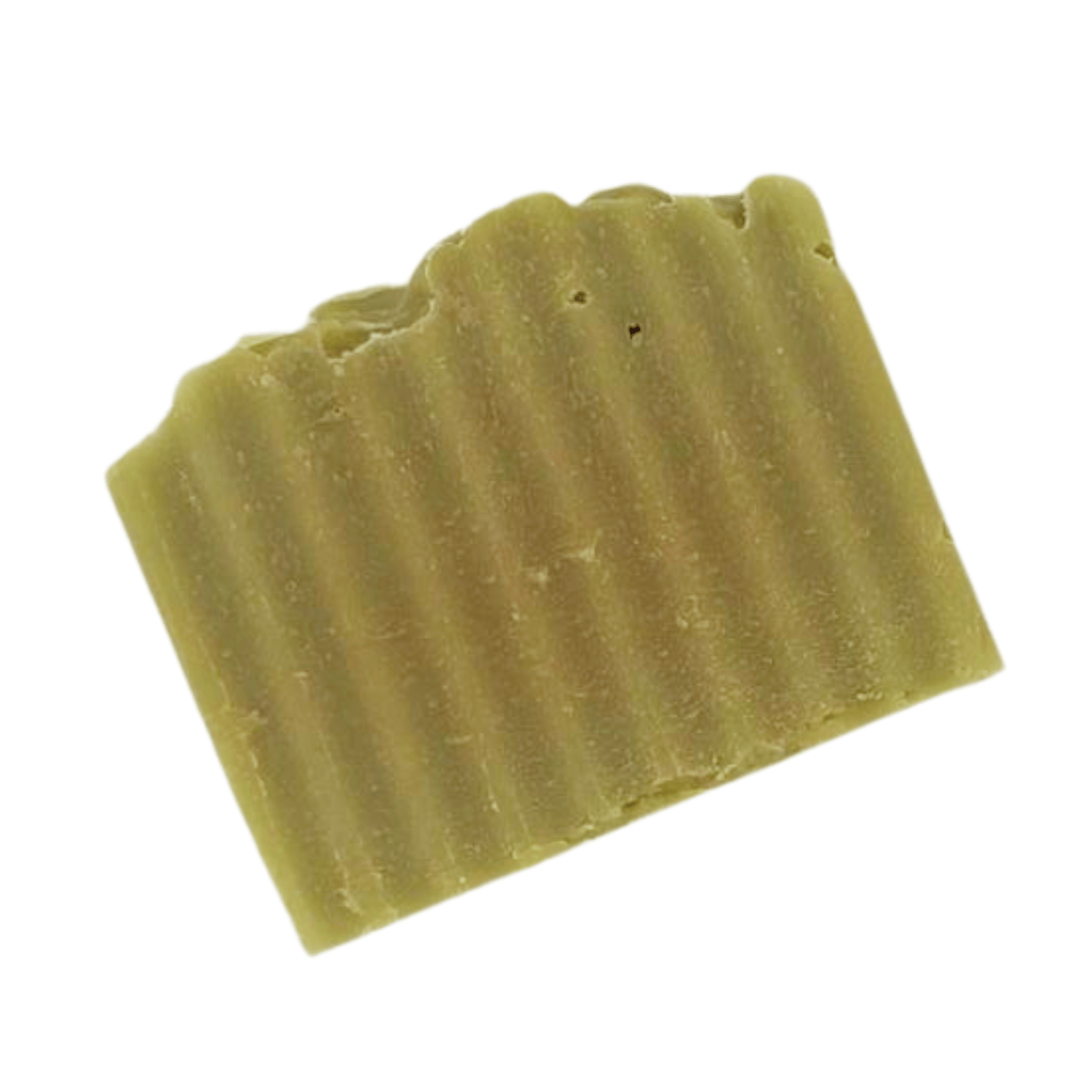 Moon Lather - This farm-inspired bar combines natural pumice for light exfoliation with mango butter for a long-lasting moisturizing soap_unpackaged soap laying on side_view from above