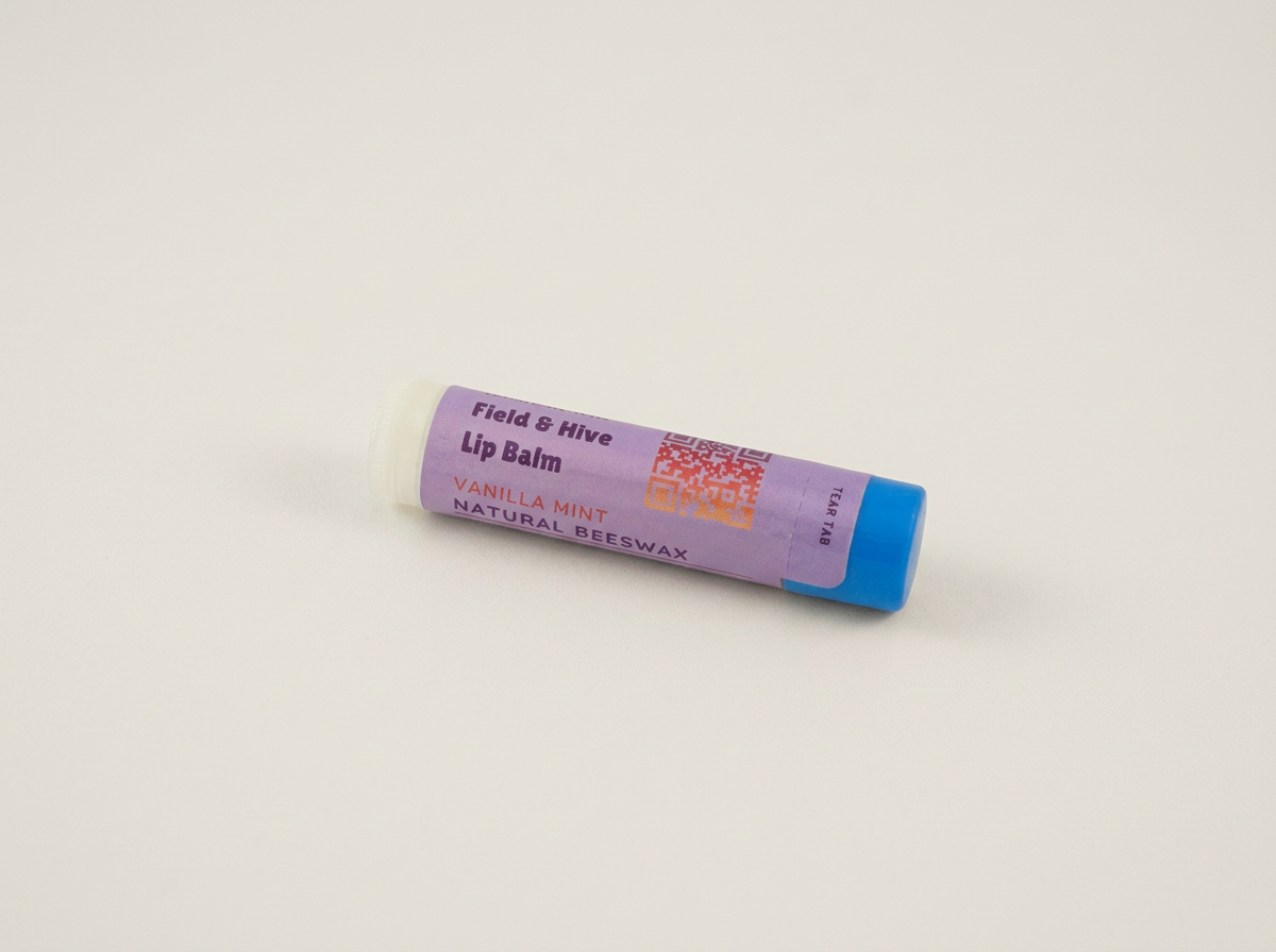 Field & Hive beeswax Vanilla Mint lip balm tube with a blue cap