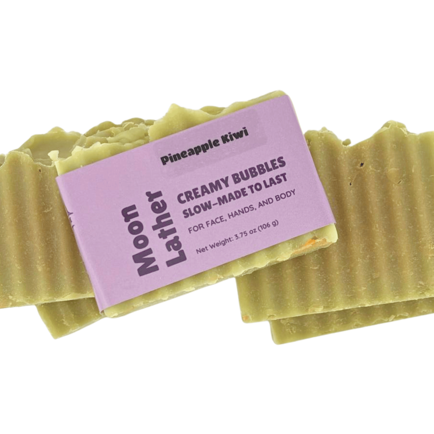 Moon Lather - This farm-inspired bar combines natural pumice for light exfoliation with mango butter for a long-lasting moisturizing soap_packaged soap stacked on unwrapped bars