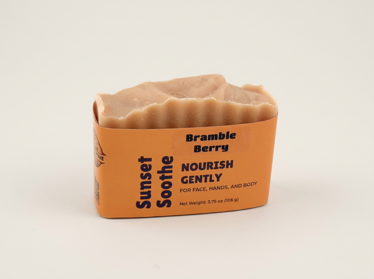 Bramble Berry Sunset Soothe soap with a pink swirled top