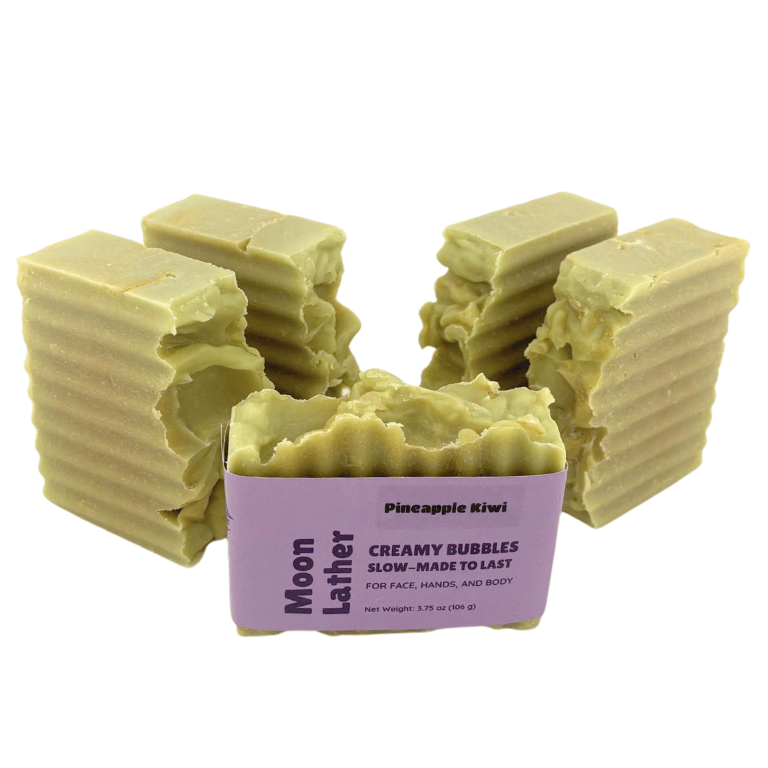 Moon Lather - This farm-inspired bar combines natural pumice for light exfoliation with mango butter for a long-lasting moisturizing soap_unpackaged soap standing on side with packaged bar in front