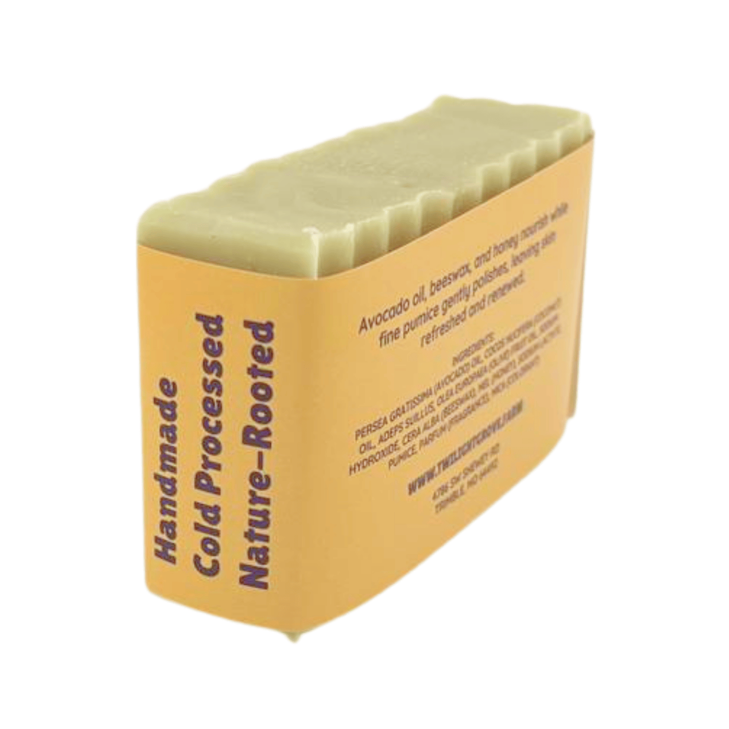 Angled back view of Sensuous Sandalwood Nature's Polish handmade soap bar showing label and natural soap texture.