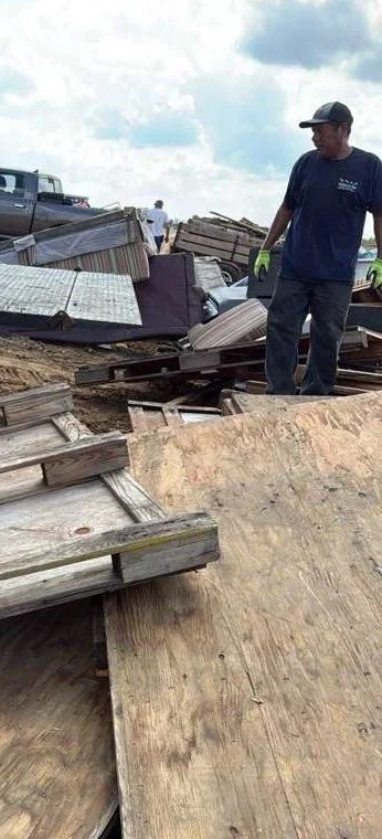 Crew member on a debris removal job