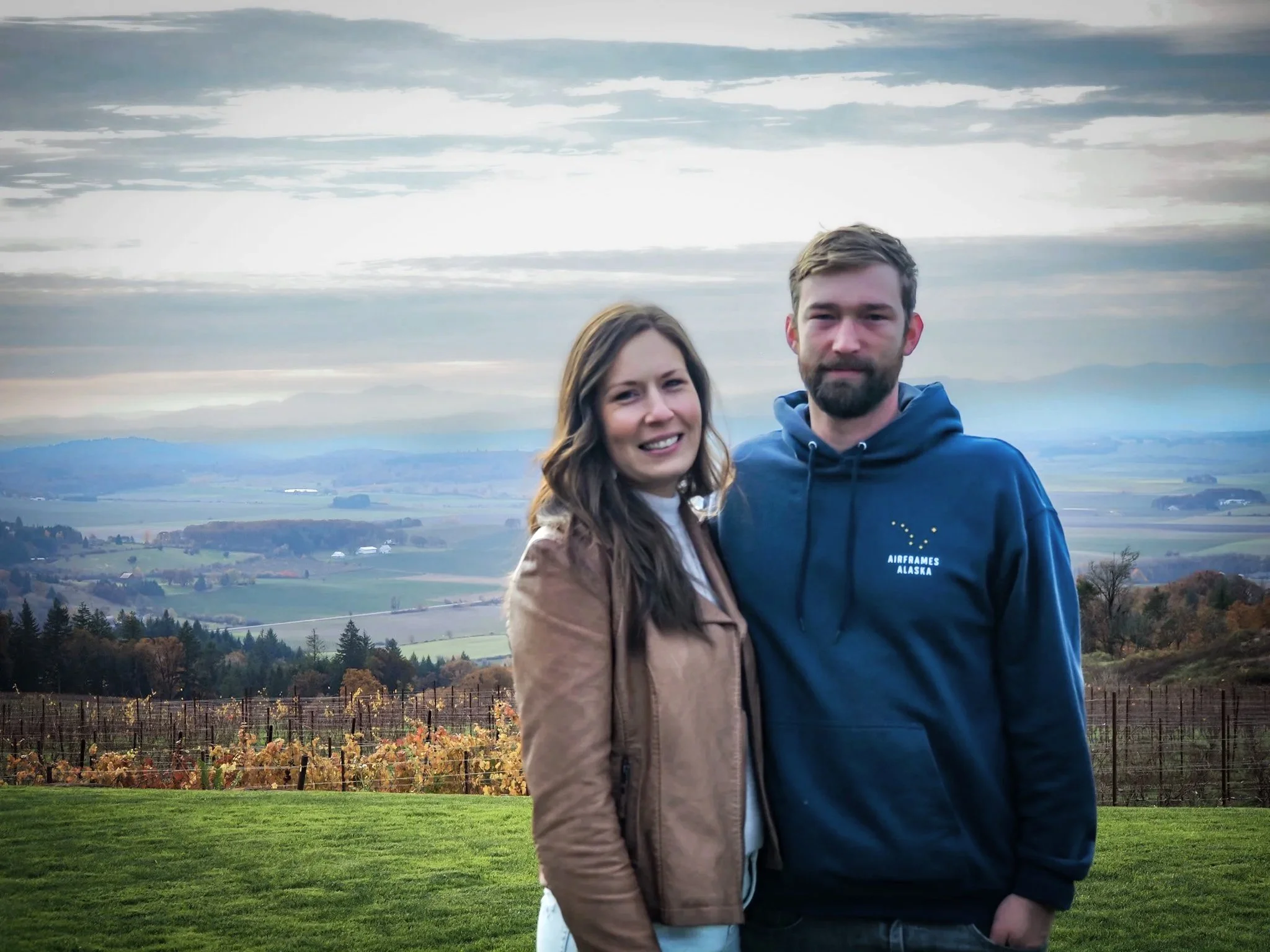 Bend business owner and her husband enjoying the peaceful vineyard setting