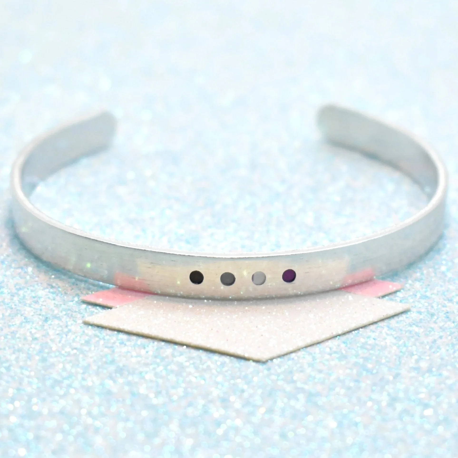 Handmade asexual pride cuff bracelet with enamel dot design