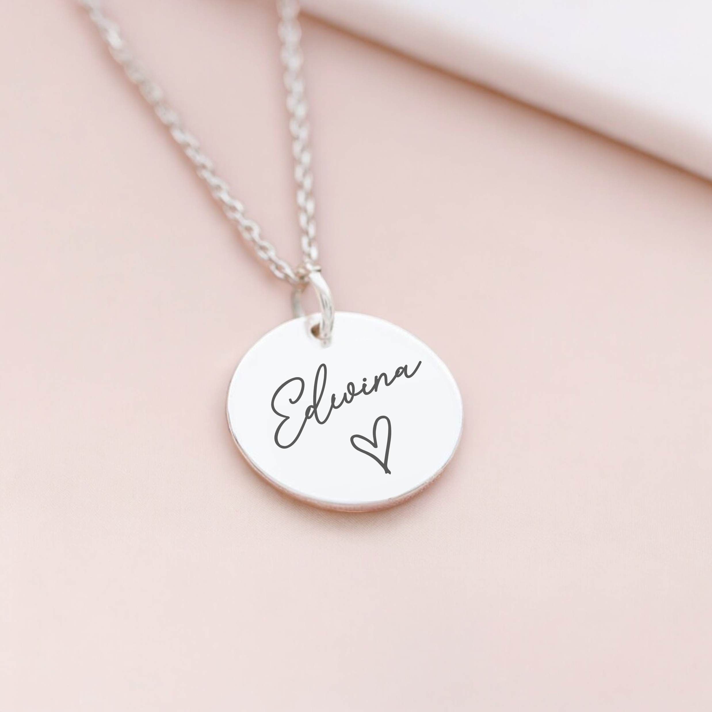Custom silver pendant necklace with name and heart design