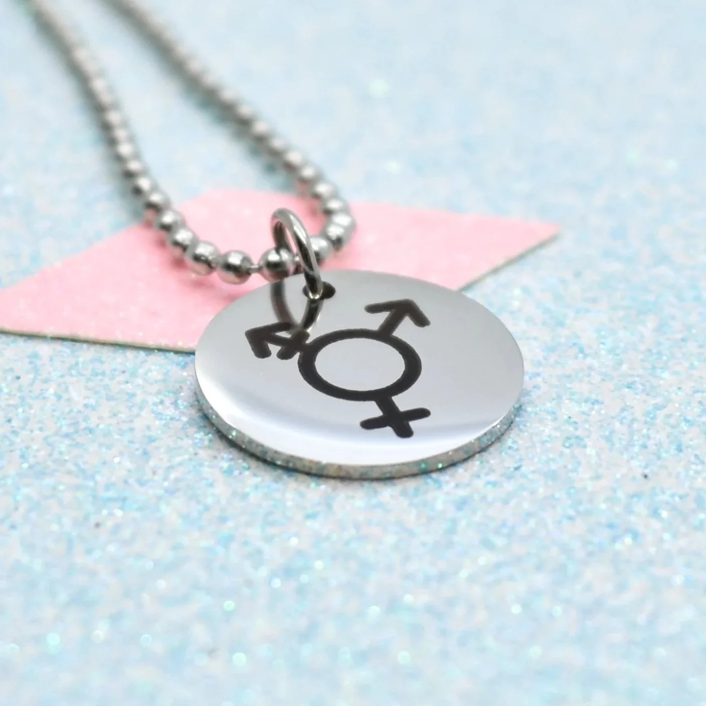 Stainless steel pendant necklace featuring transgender symbol