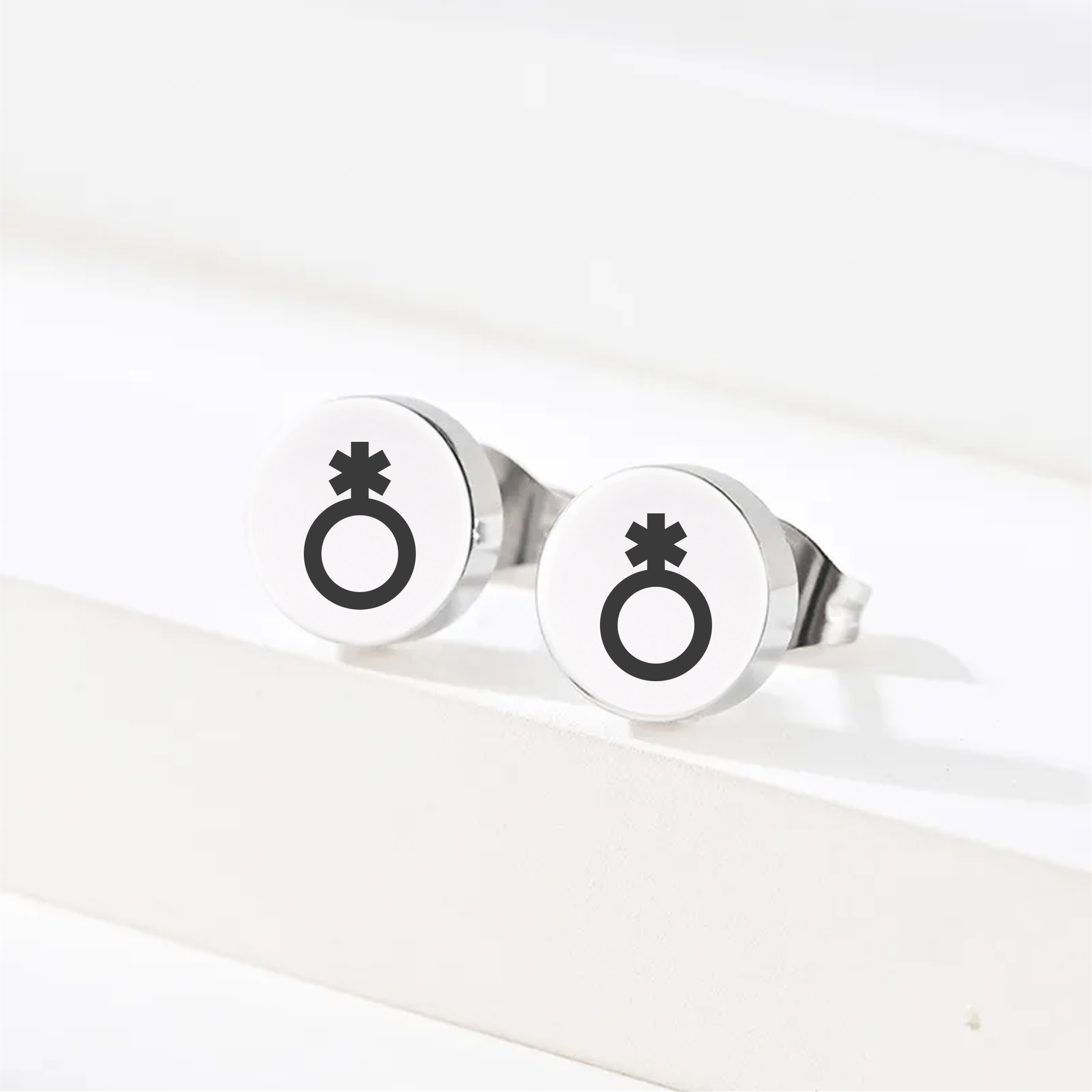Gold stainless steel non-binary symbol earrings minimalist design