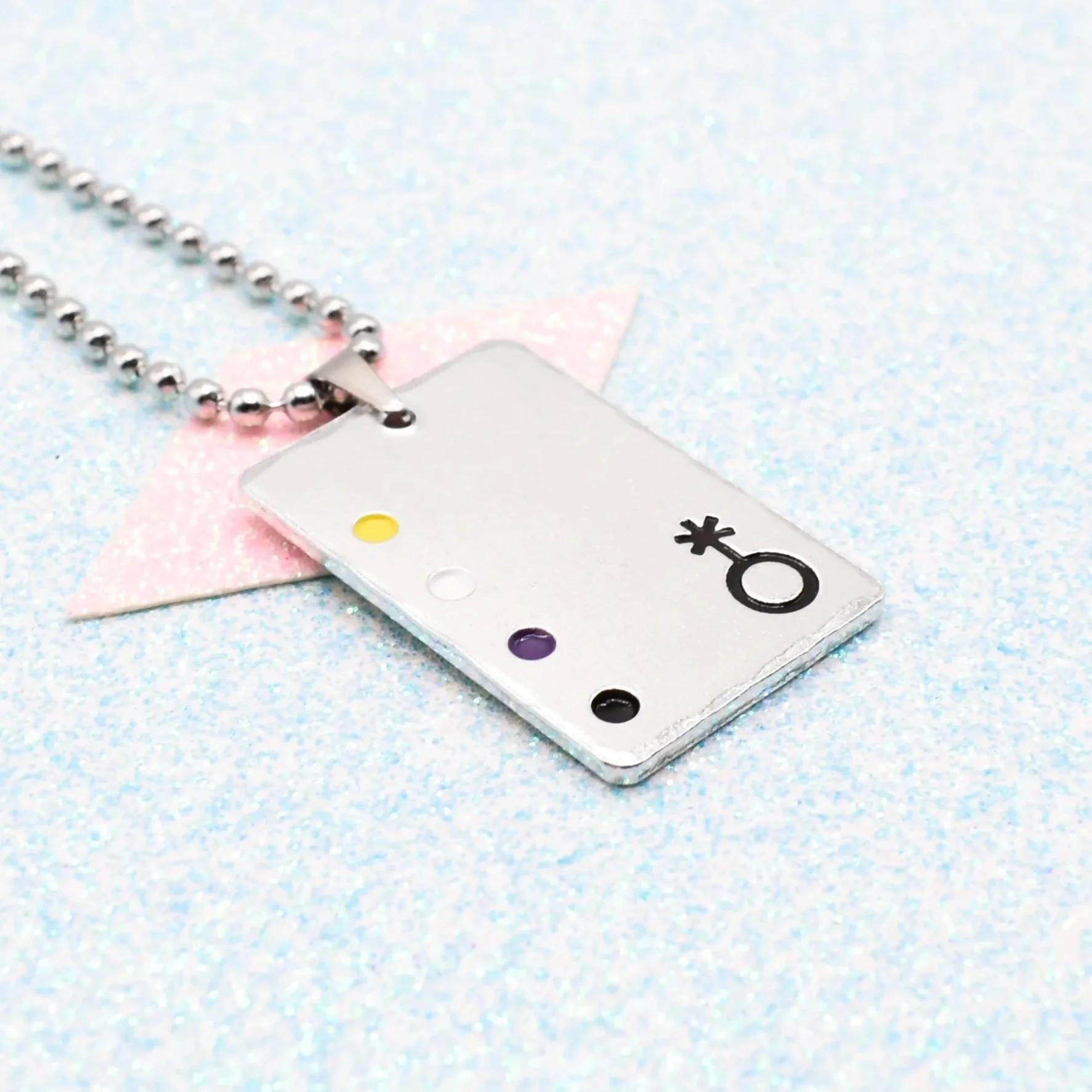 Stainless steel non-binary pendant with gender symbol