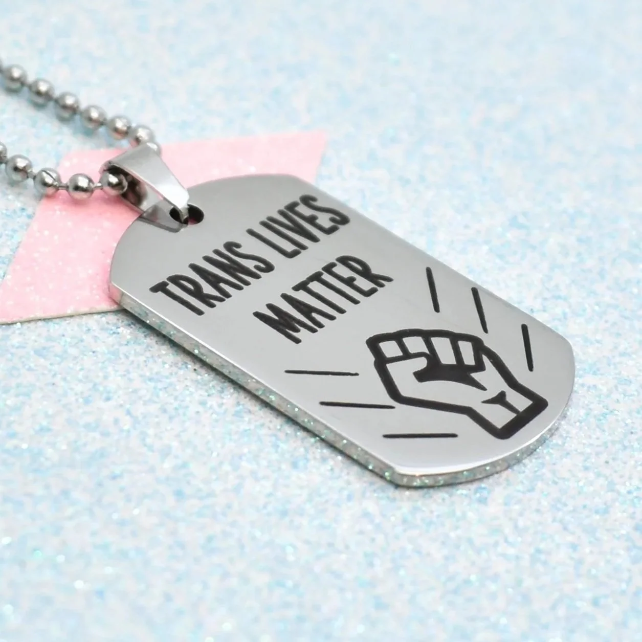 Stainless steel Trans Lives Matter necklace with protest dog tag pendant