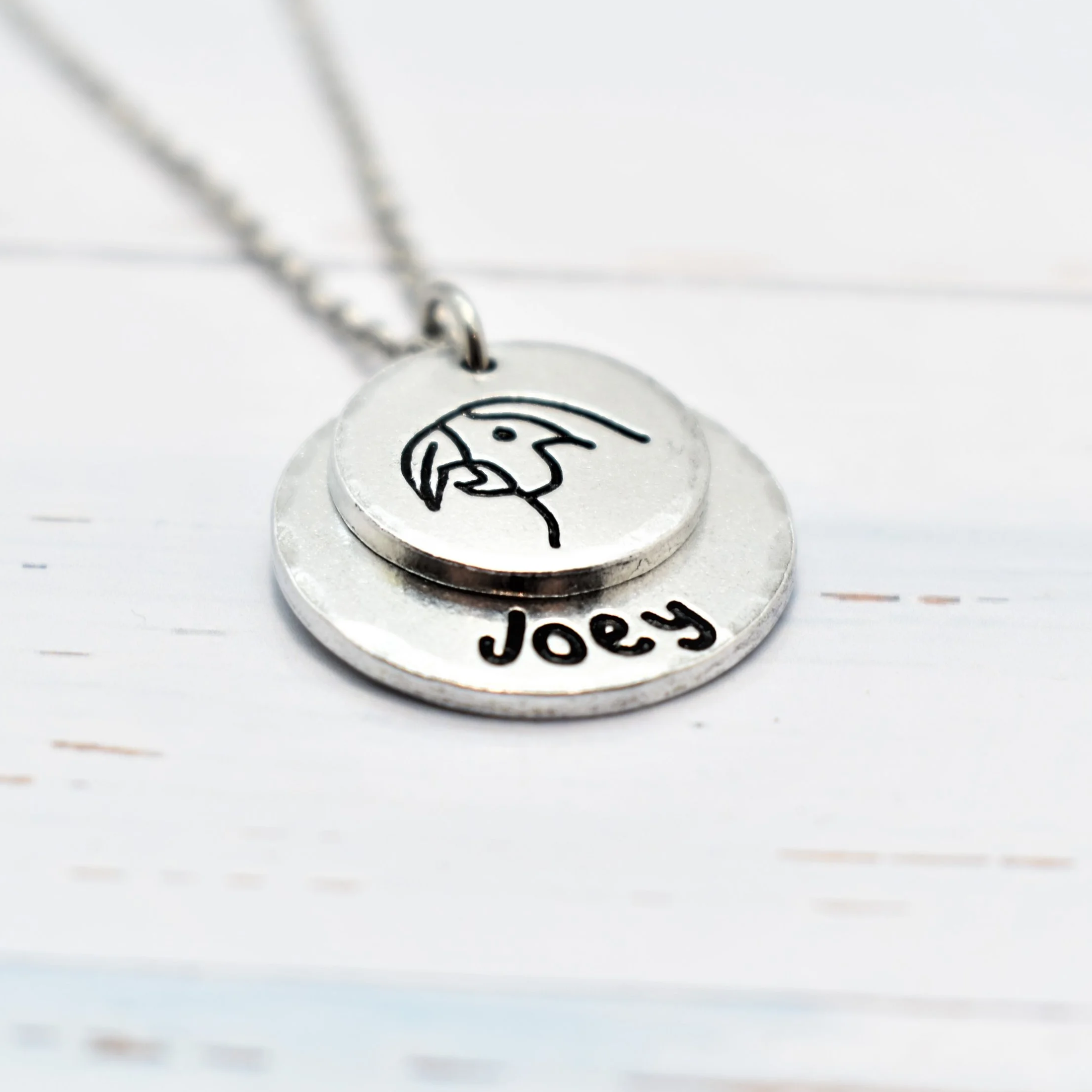 Parrot Memorial Necklace featuring a custom name in Silver