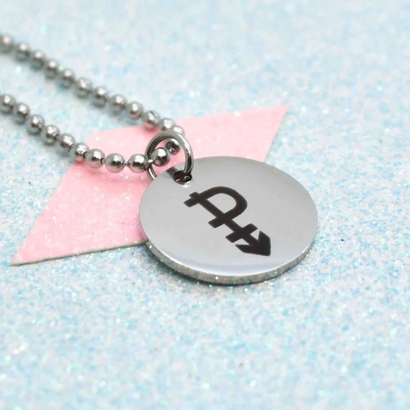 Stainless steel pendant featuring pansexual pride symbol