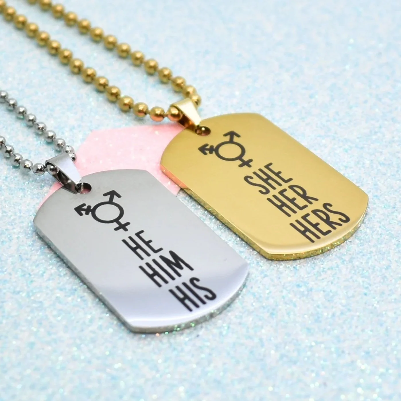 Gold and silver pronoun necklaces LGBTQ+ pride jewellery
