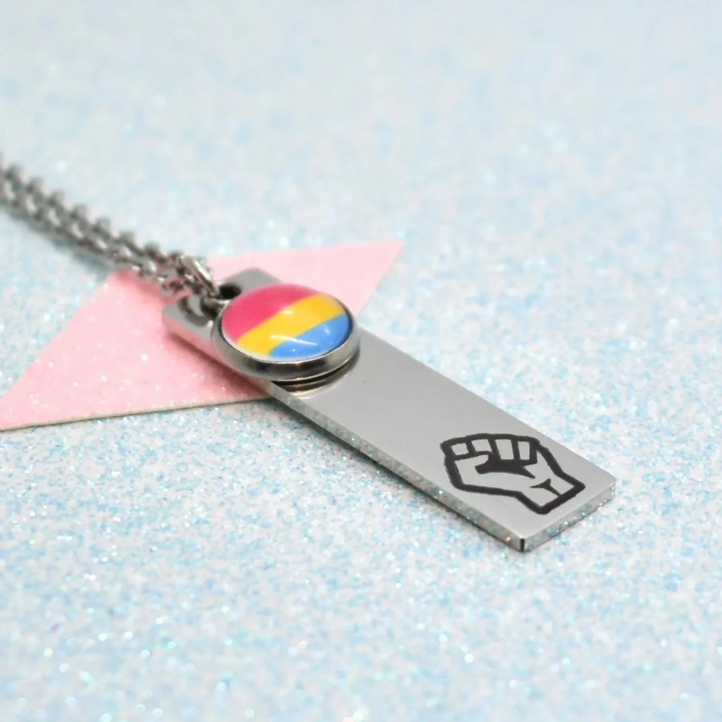 Queer resistance pendant with LGBTQ+ empowerment design