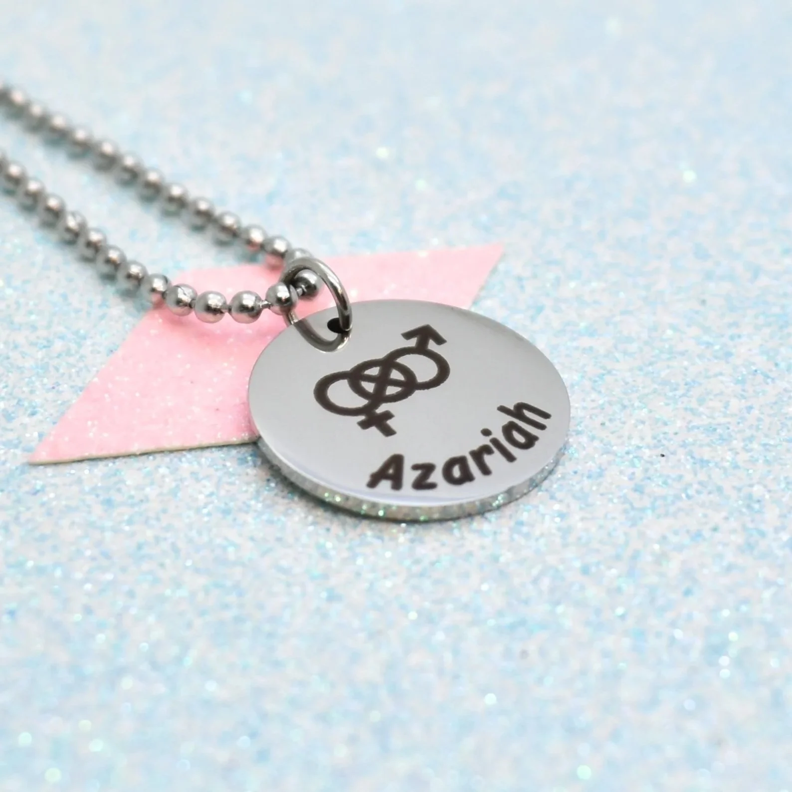 Personalised bisexual pride jewellery featuring engraved pride symbol