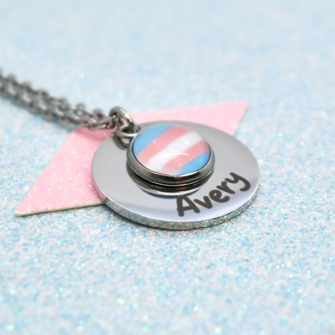 Engraved transgender pride necklace with blue, pink, and white flag