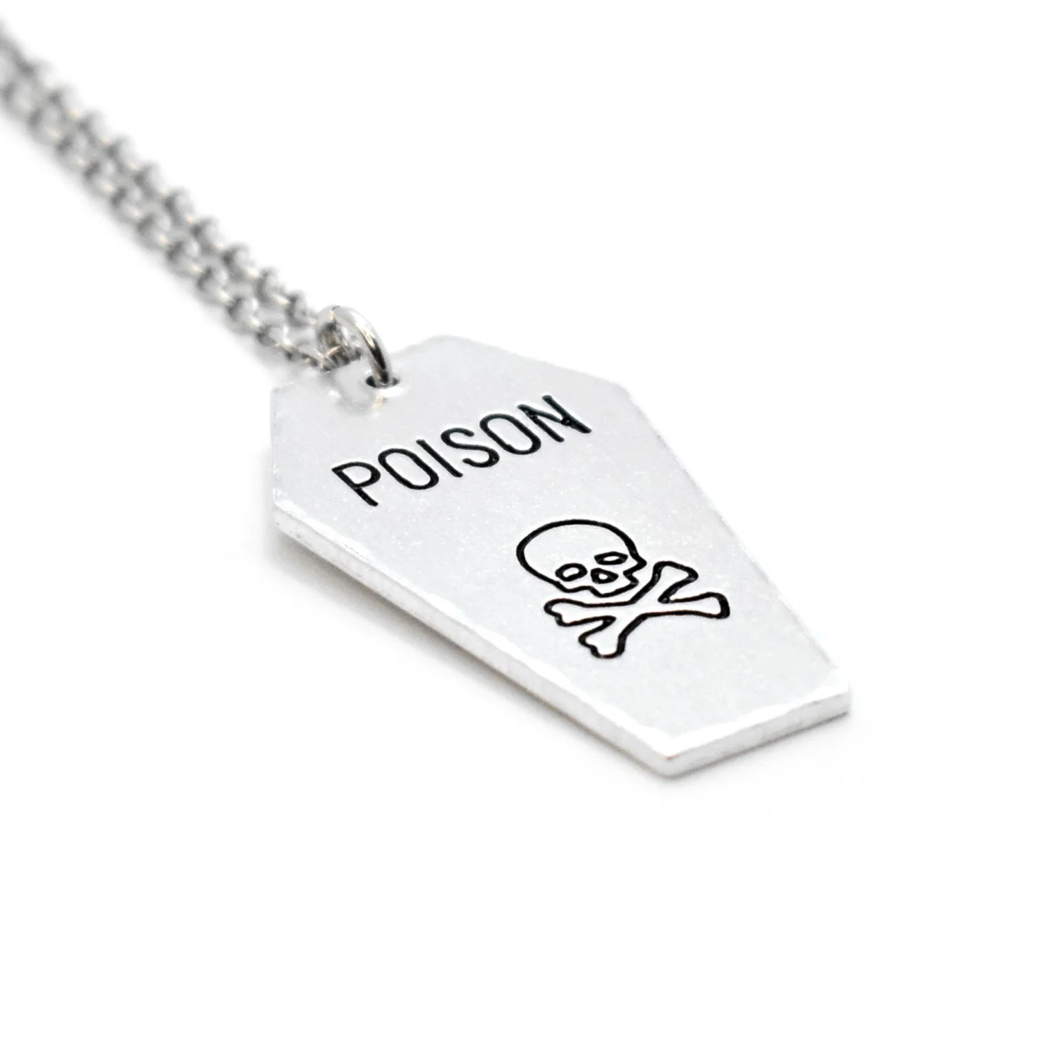 coffin pendant engraved with poison skull bones design