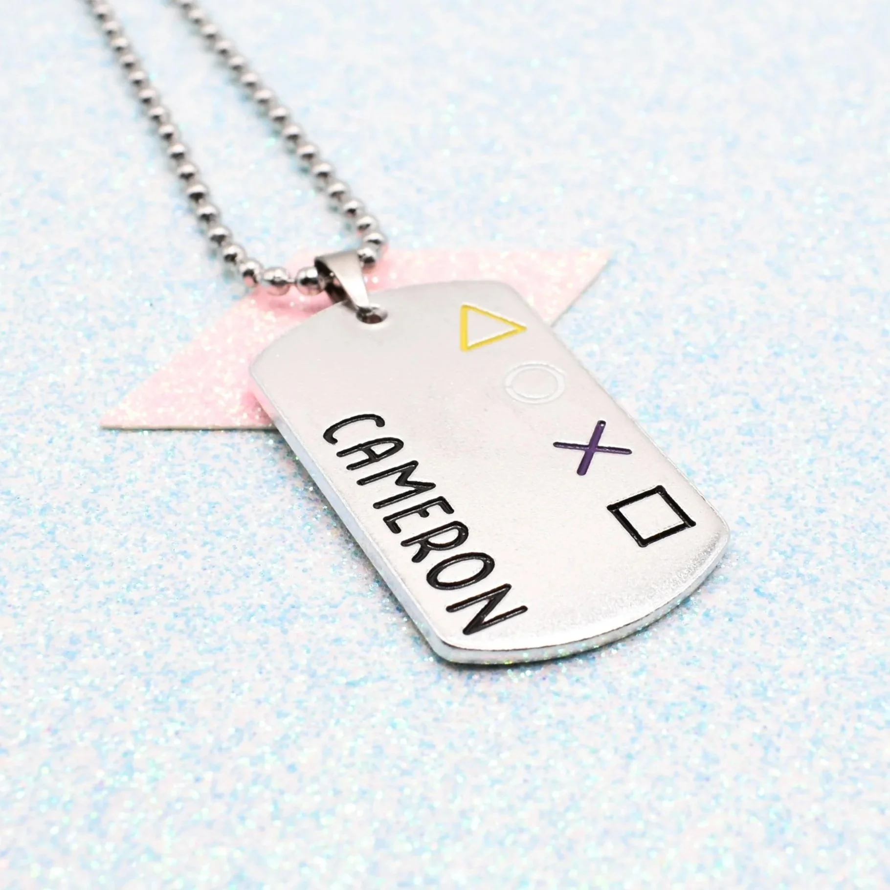 Personalised non-binary pride jewellery with gamer symbols
