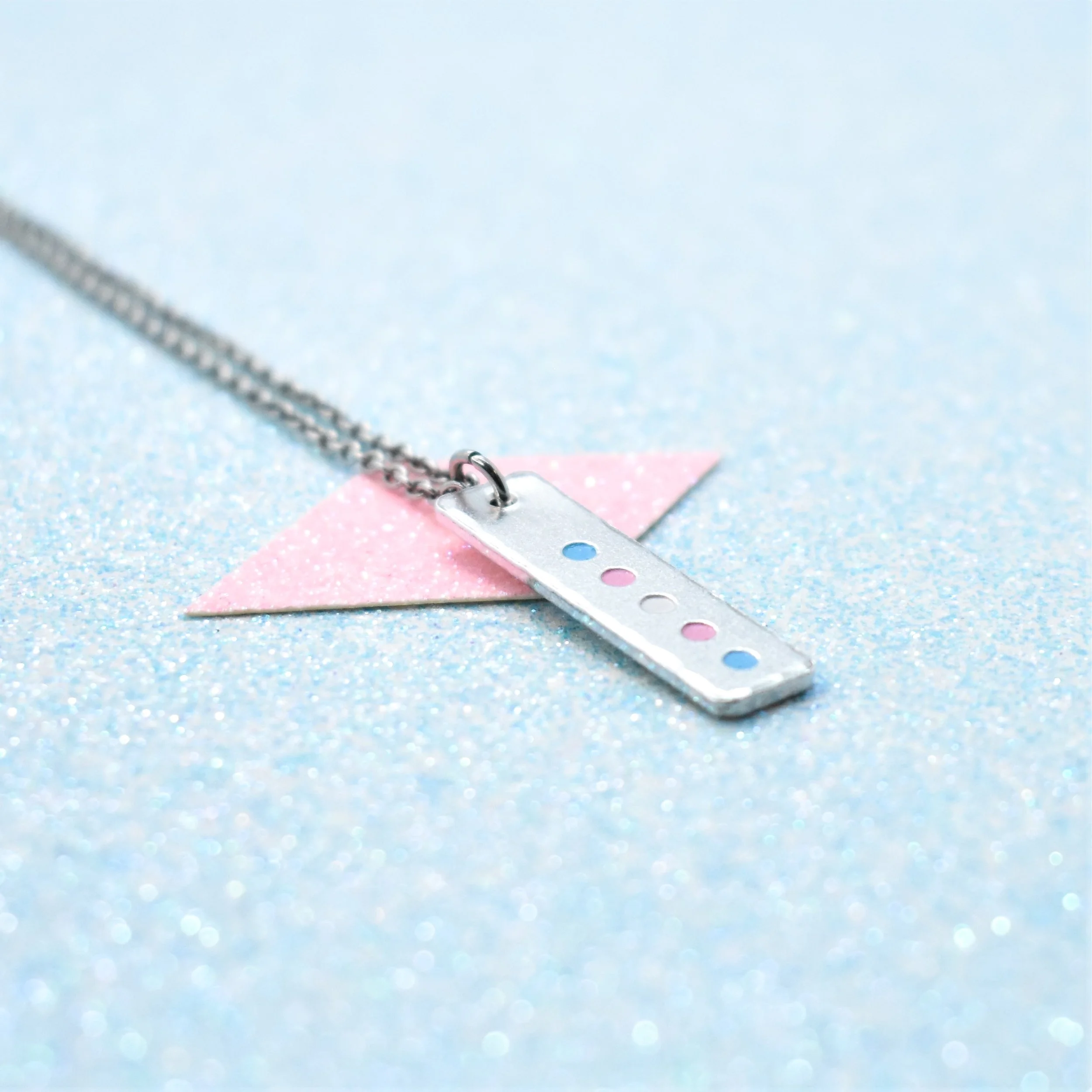 minimalist LGBTQ+ necklace for trans visibility