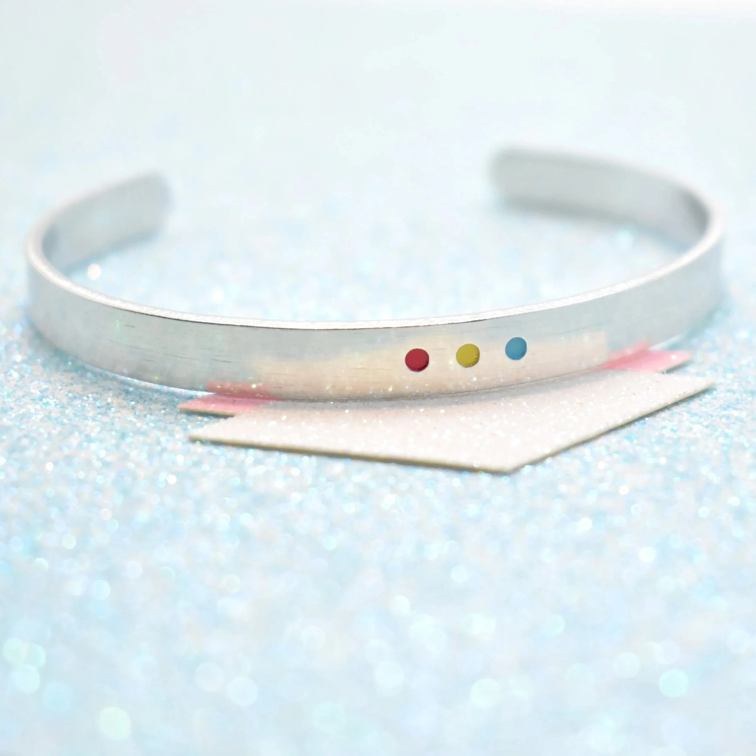 LGBTQ+ pansexual flag bracelet paired with pride necklaces