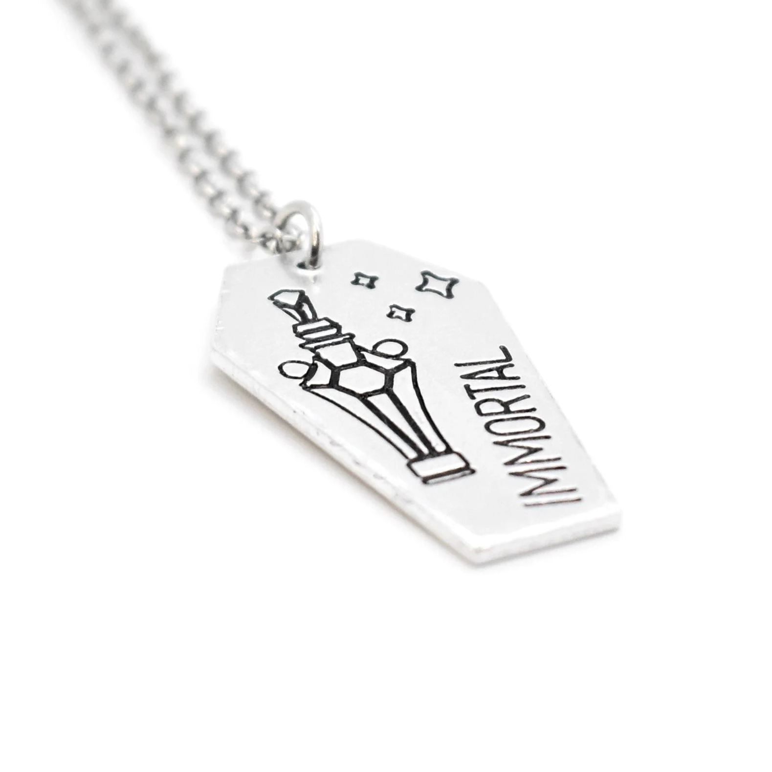 coffin pendant engraved with immortal alchemy elixir design