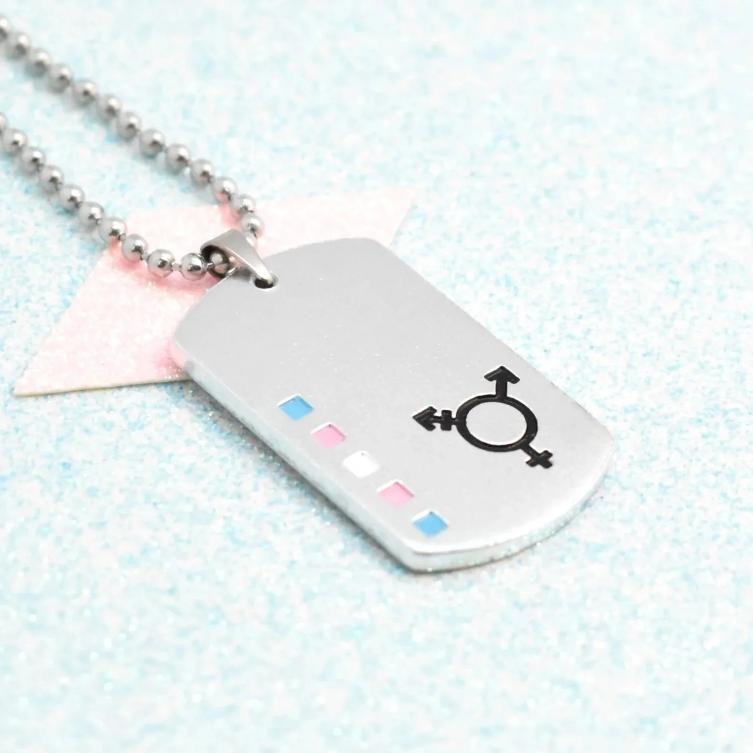 Pendant hand-stamped with transgender pride symbol and flag colours