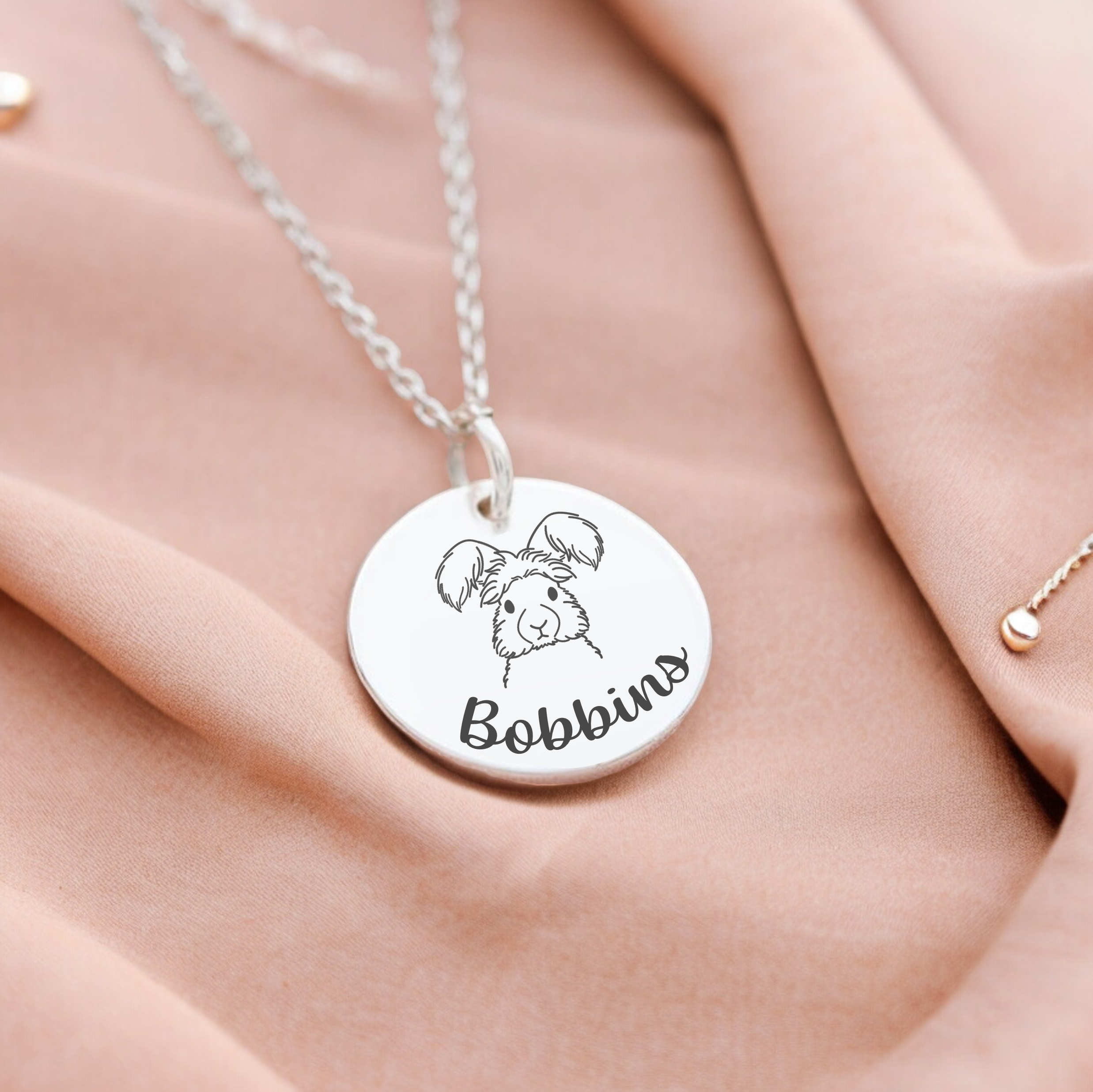 Custom necklace featuring a rabbit and complete with a name or date in Silver