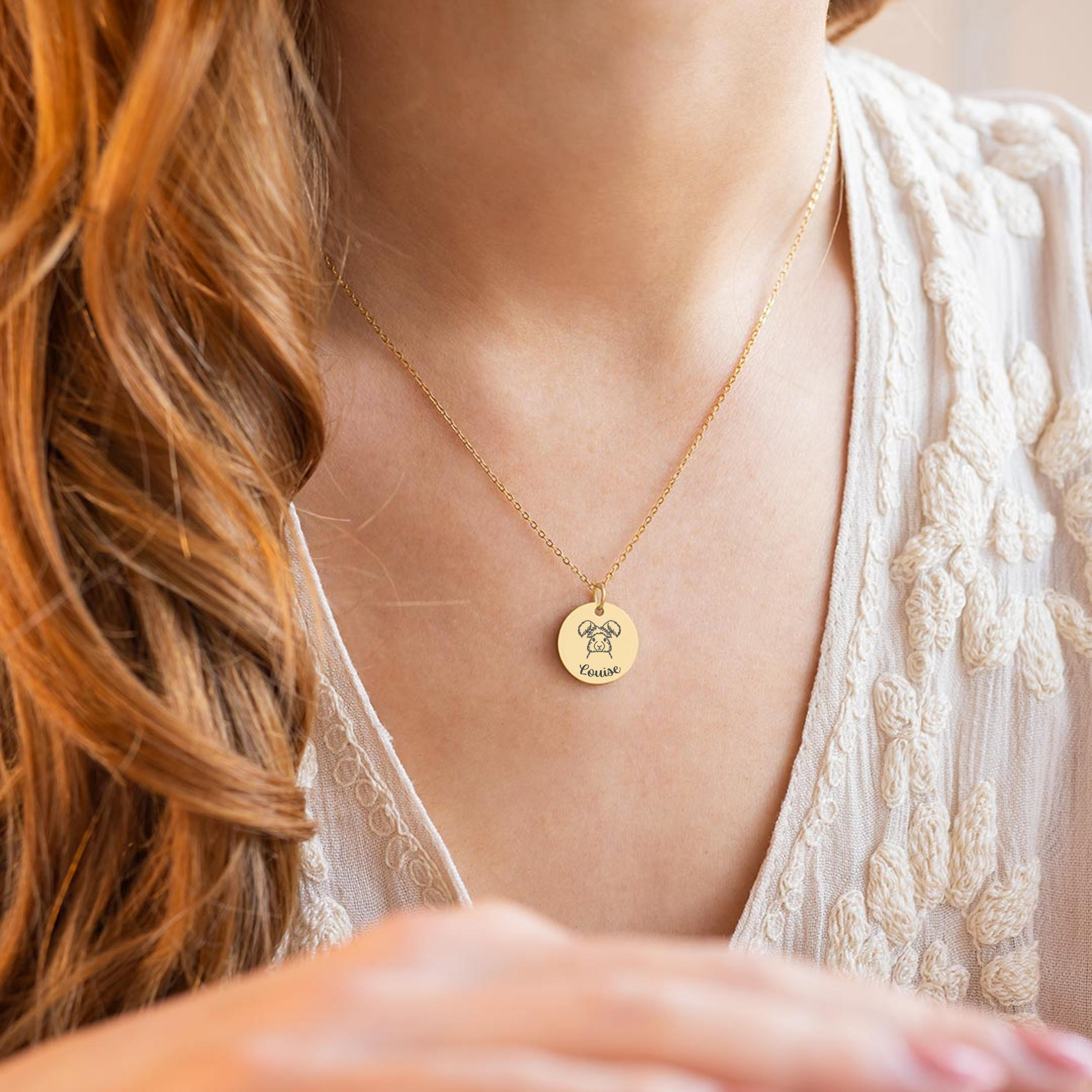 A model wearing a gold personalised rabbit necklace