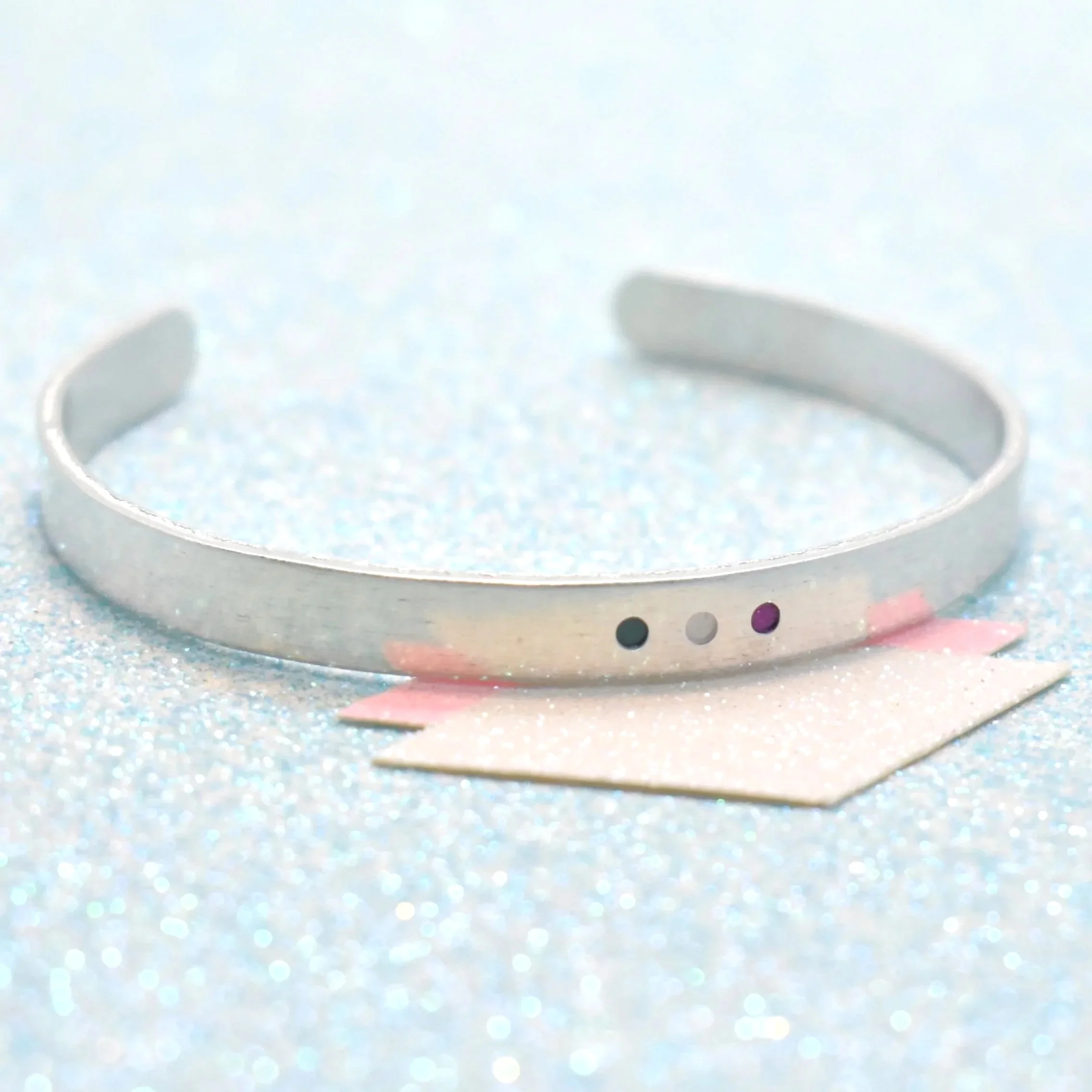 Handmade genderqueer pride cuff bracelet with minimalist enamel design
