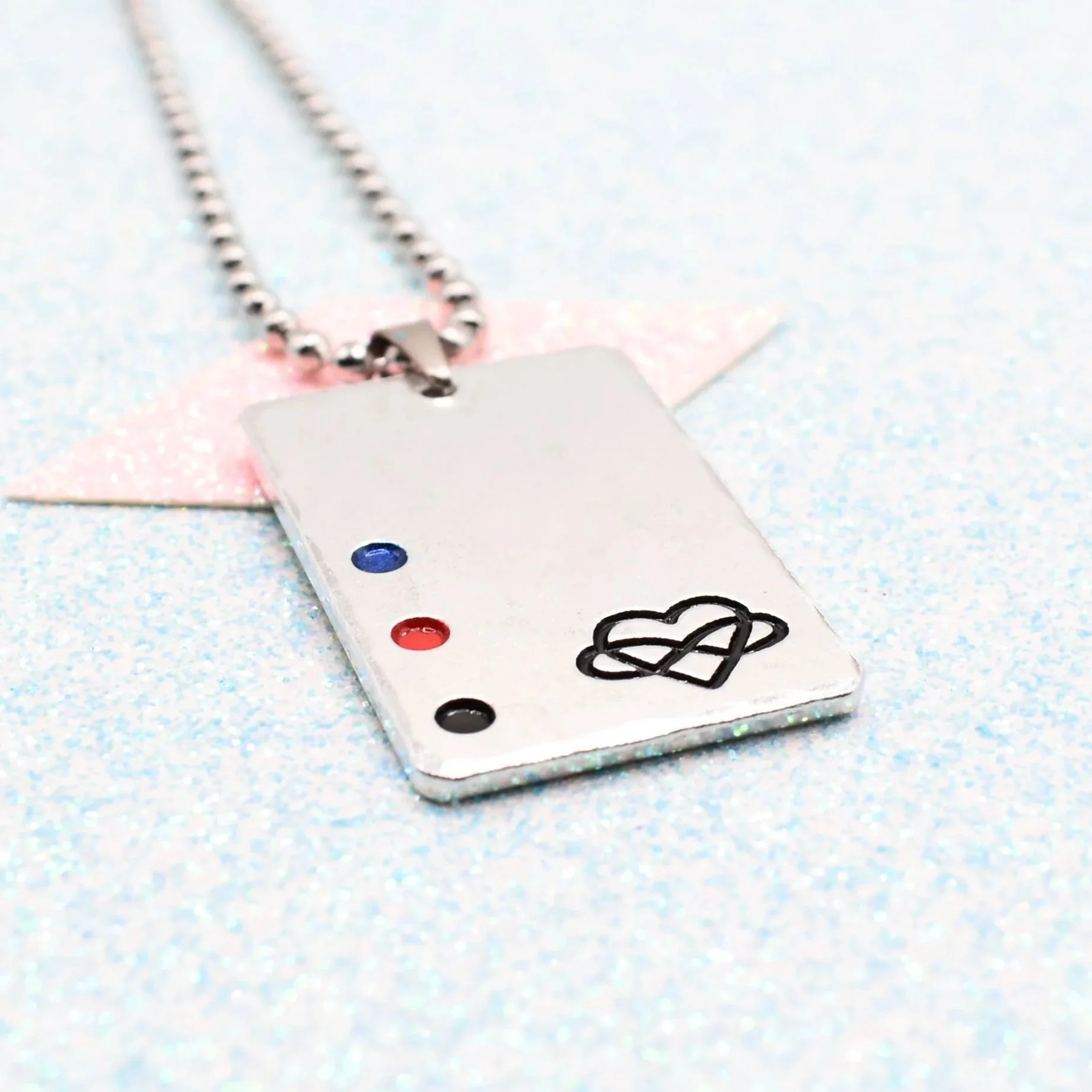 Polyamory pride necklace with infinity heart symbol and flag colours