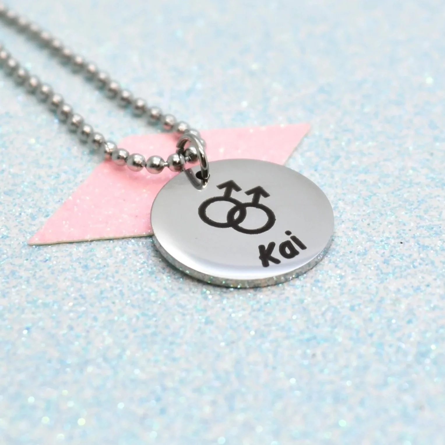 Personalised gay pride jewellery featuring male gender symbols