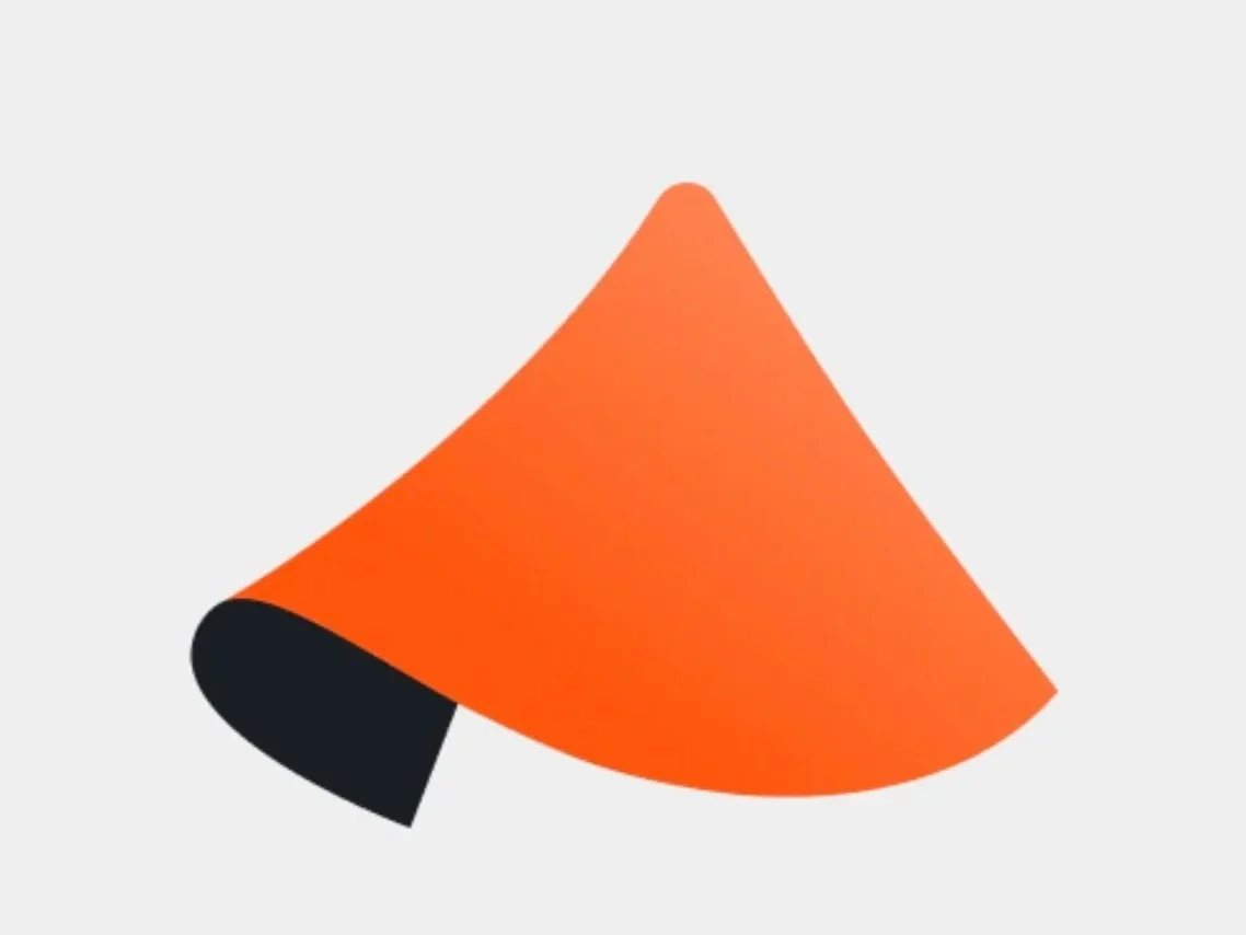 An orange and black hair extension or clip-on hair piece.