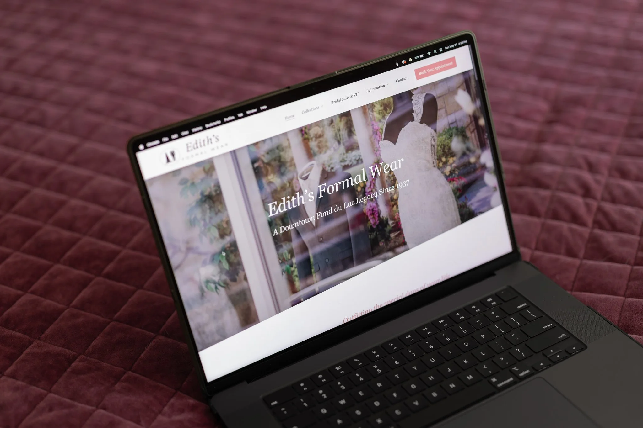 Laptop displaying the Edith's Formal Wear website homepage