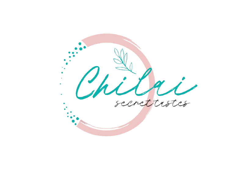 Logo for Chilai Secretos featuring cursive teal text and a pink semi-circle with teal dots, and a small teal leafy branch.