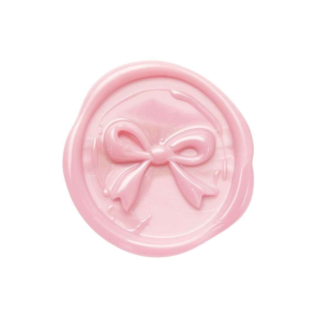 Pink circular soap with a bow design embossed on the surface.