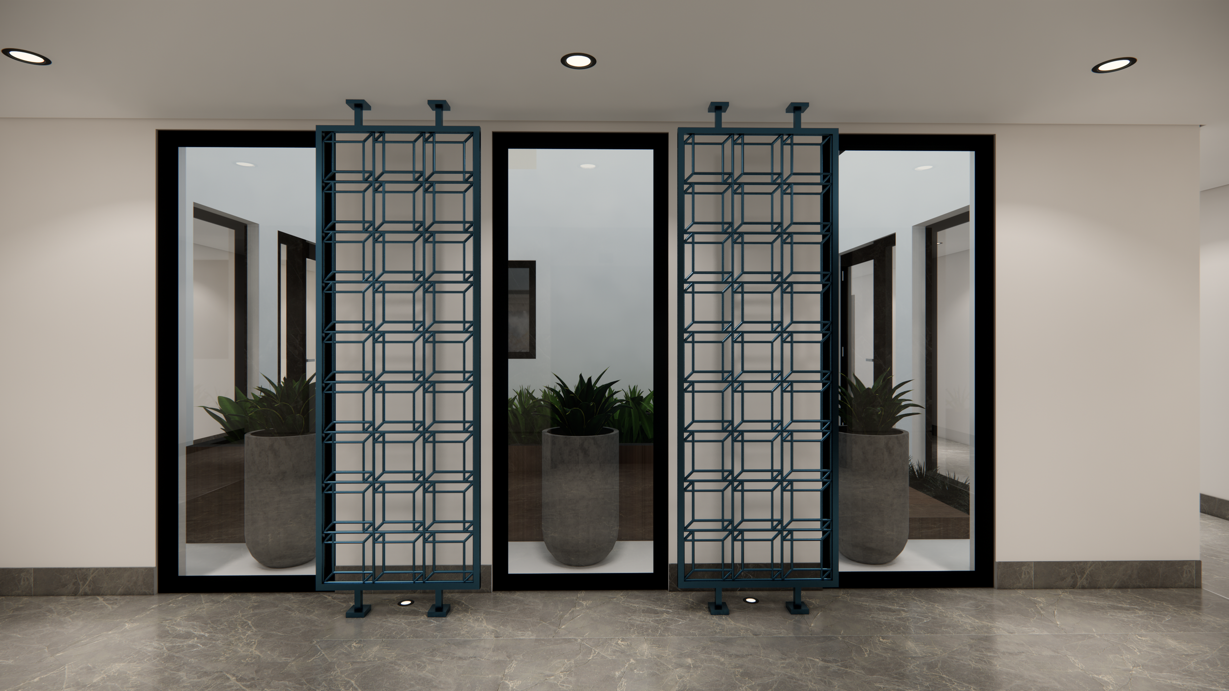 Modern glass doors with decorative metal panels, interior hallway with potted plants, marble flooring, and ceiling lights.