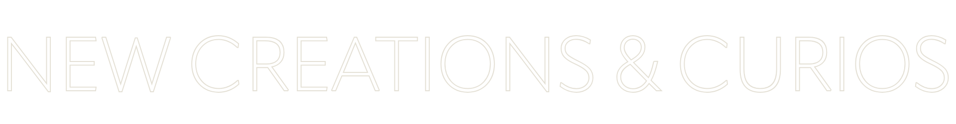 Text saying 'NEW CREATIONS & CURIOS' in white against a black background.