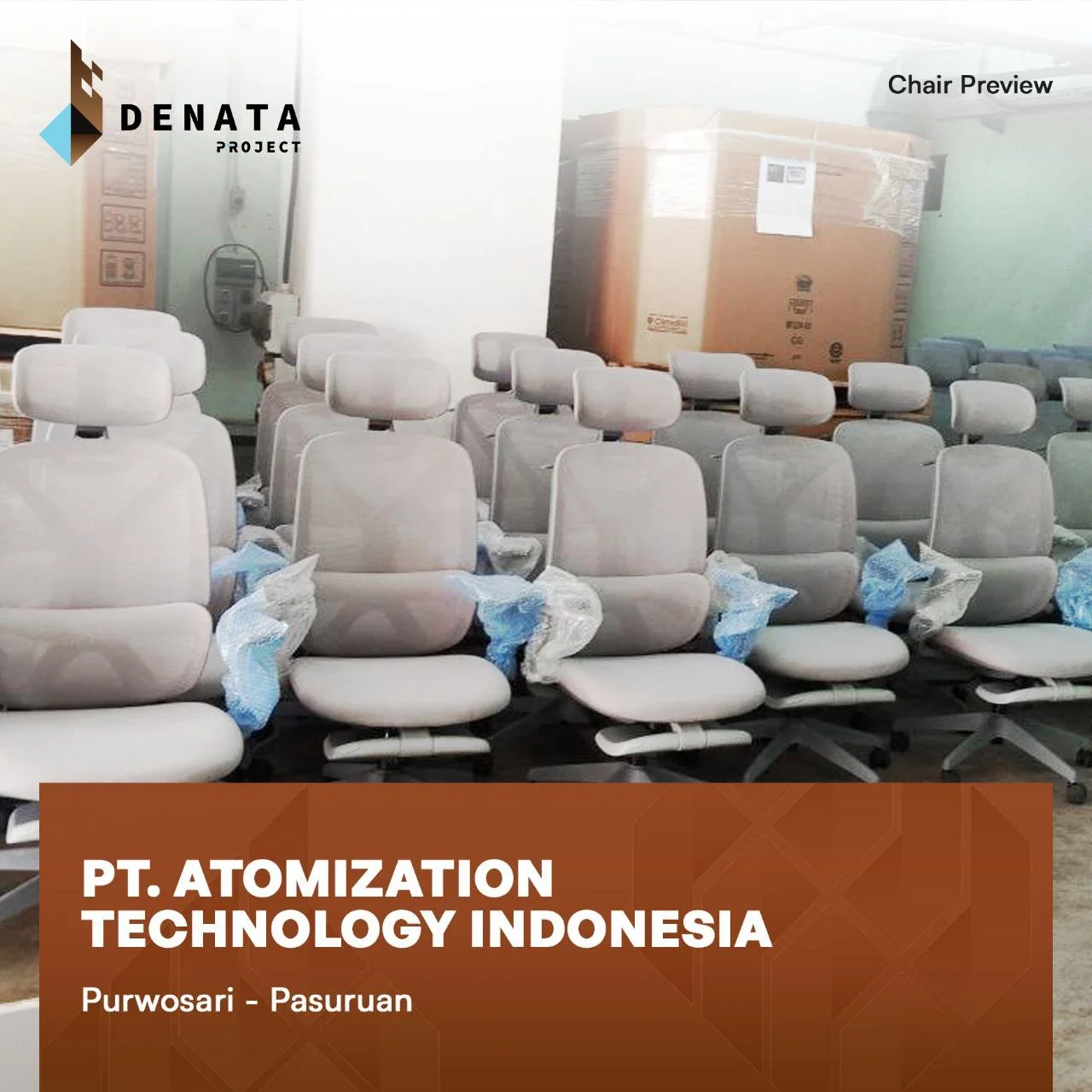 Multiple beige office chairs with headrests and armrests, some wrapped in plastic, arranged in rows in a room with a cardboard box in the background. The image has a label for PT. Atomization Technology Indonesia in Purwosari - Pasuruan, with a banne