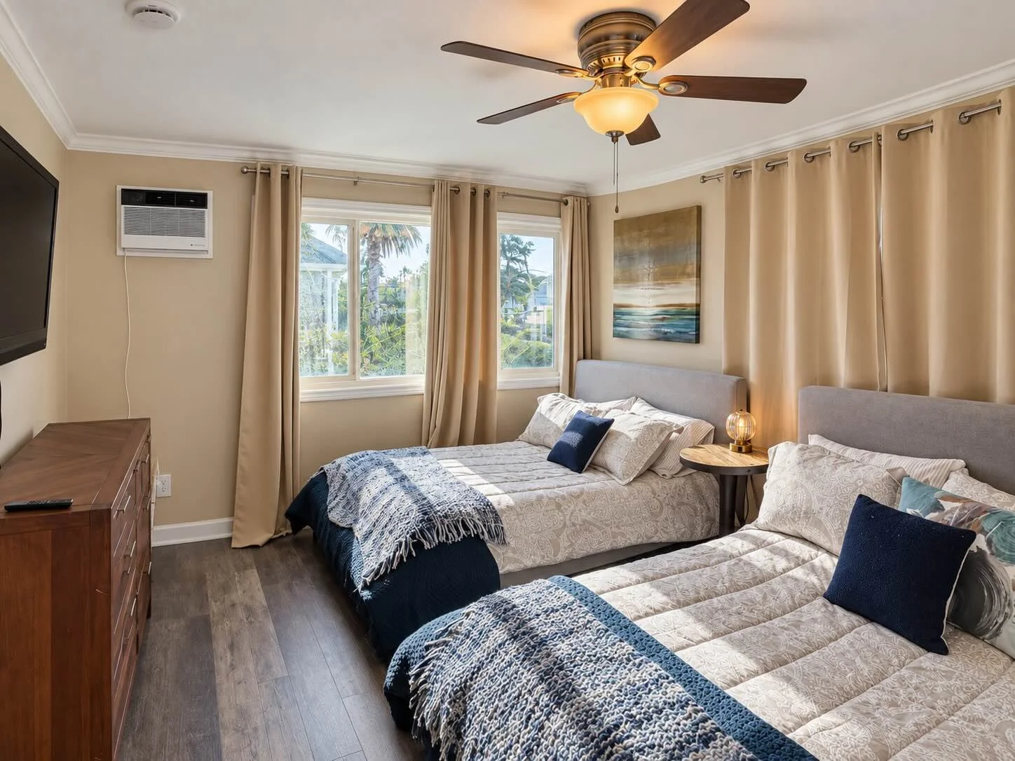 Shared bedroom with two beds and natural window light at Salterra OC Detox & Treatment