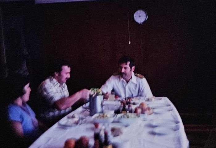 Dining at the Captain's table onboard the Tropical Moon, 1979